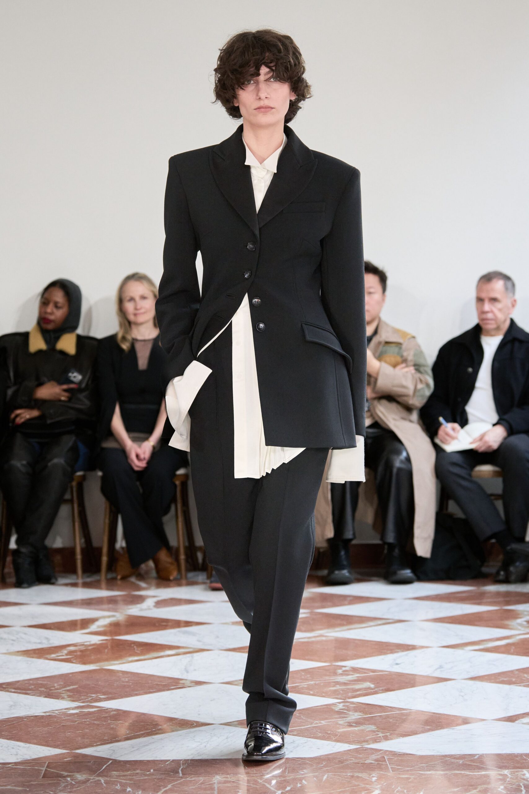 black wool long-sleeve collared structured buttoned suit