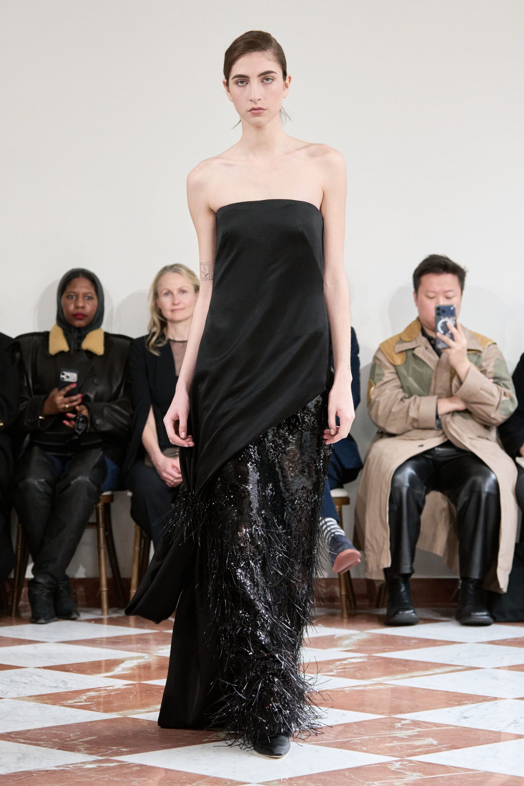 black silk strapless fitted ruffled maxi gown
