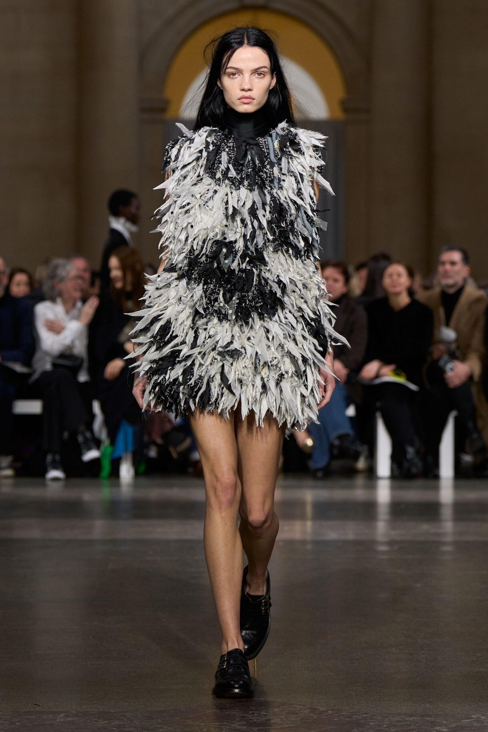 black feather sleeveless high-neck fitted ruffled layered dress