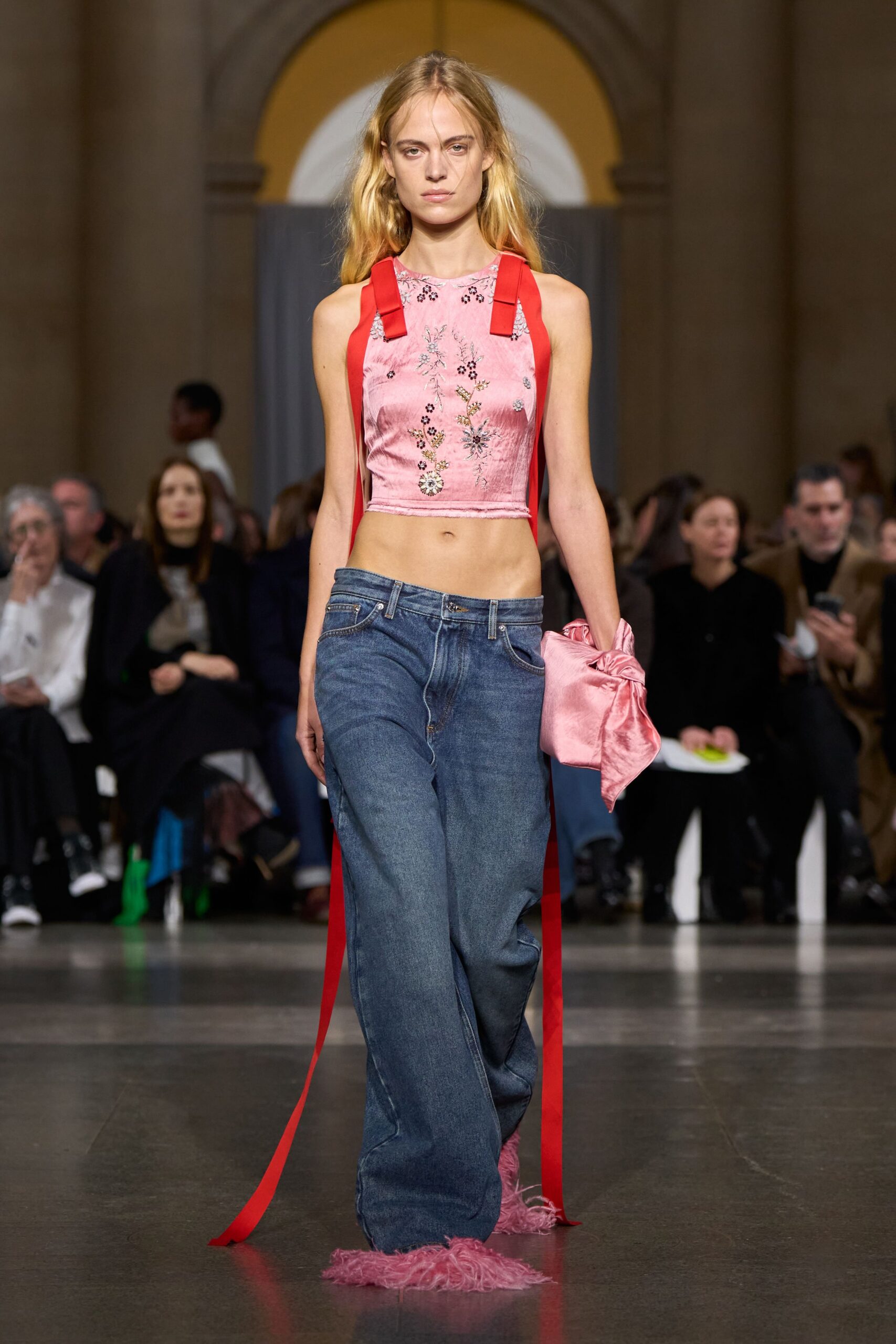 pink embroidered top with denim pants