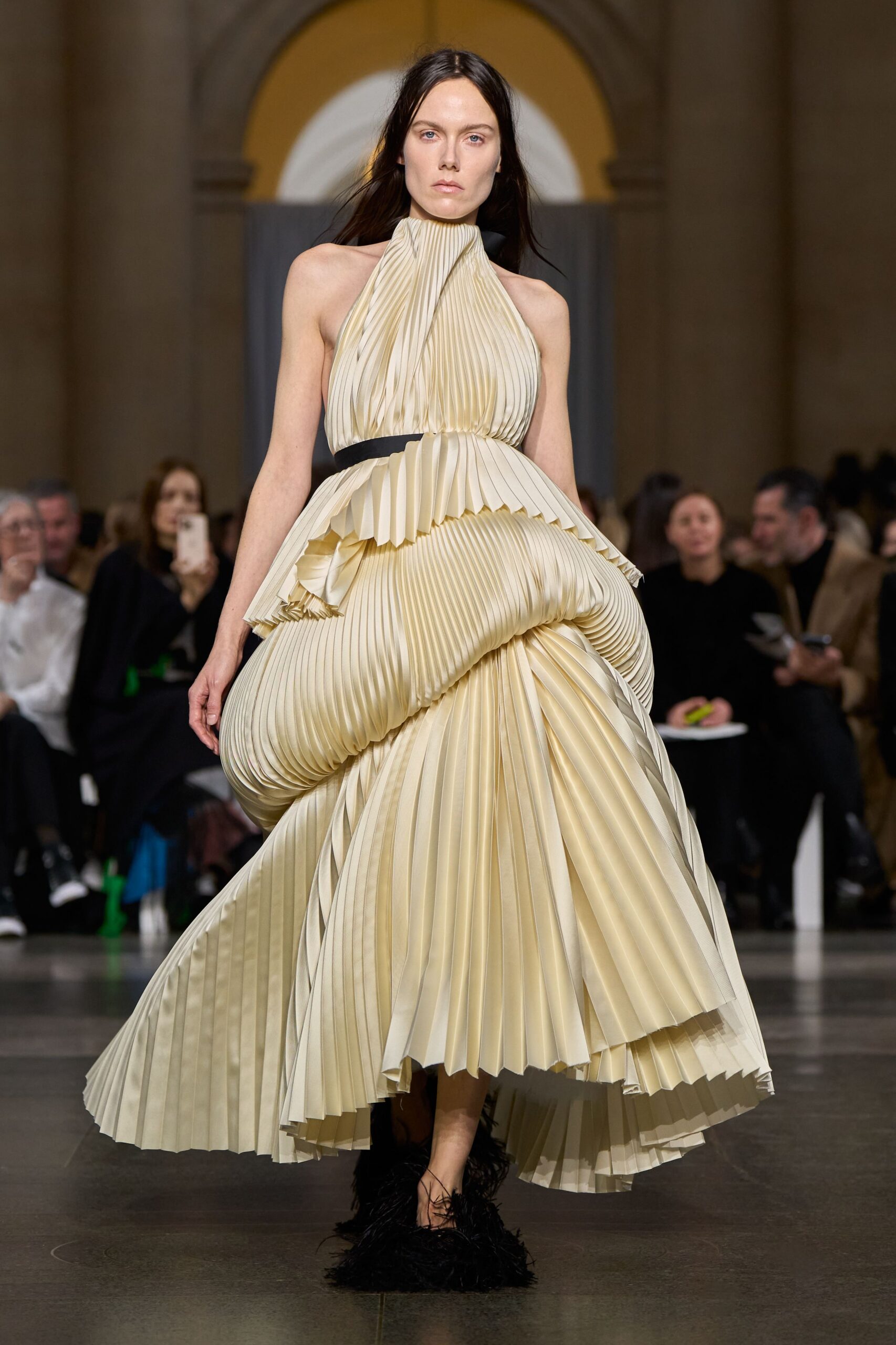 ivory silk sleeveless high-neck fitted pleated draped gown