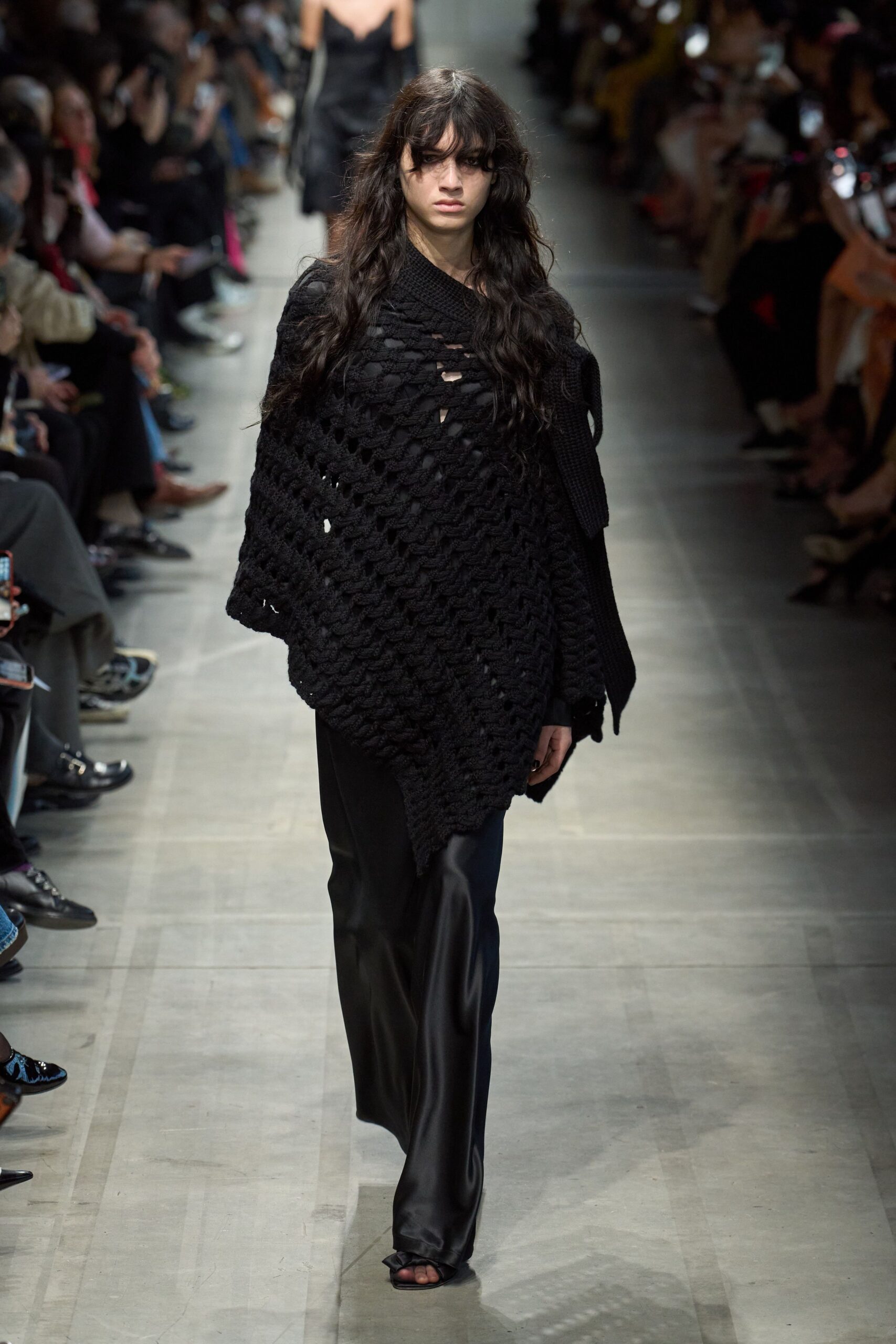 black knit sleeveless relaxed layered poncho