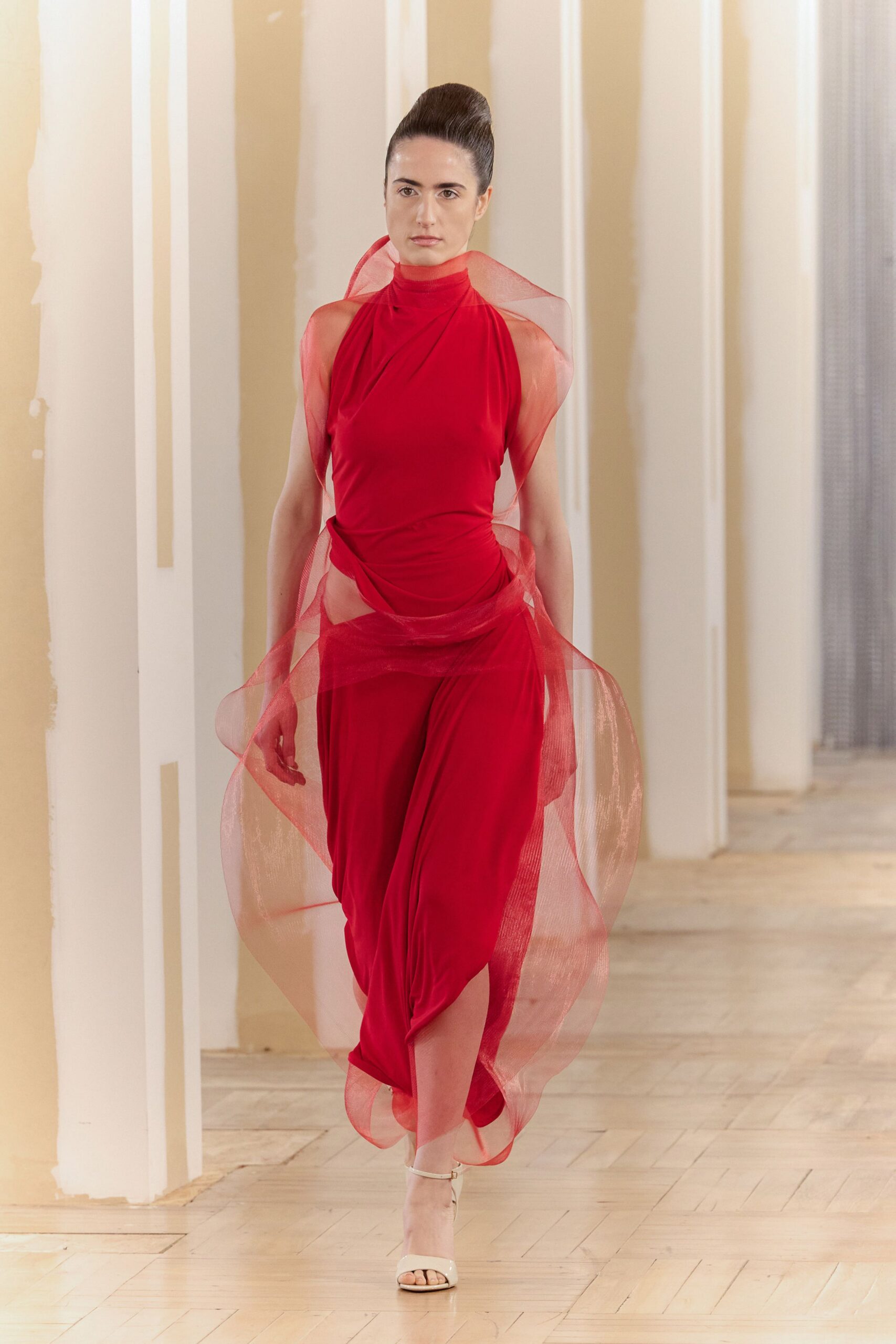 red silk sleeveless high-neck fitted draped flowing dress