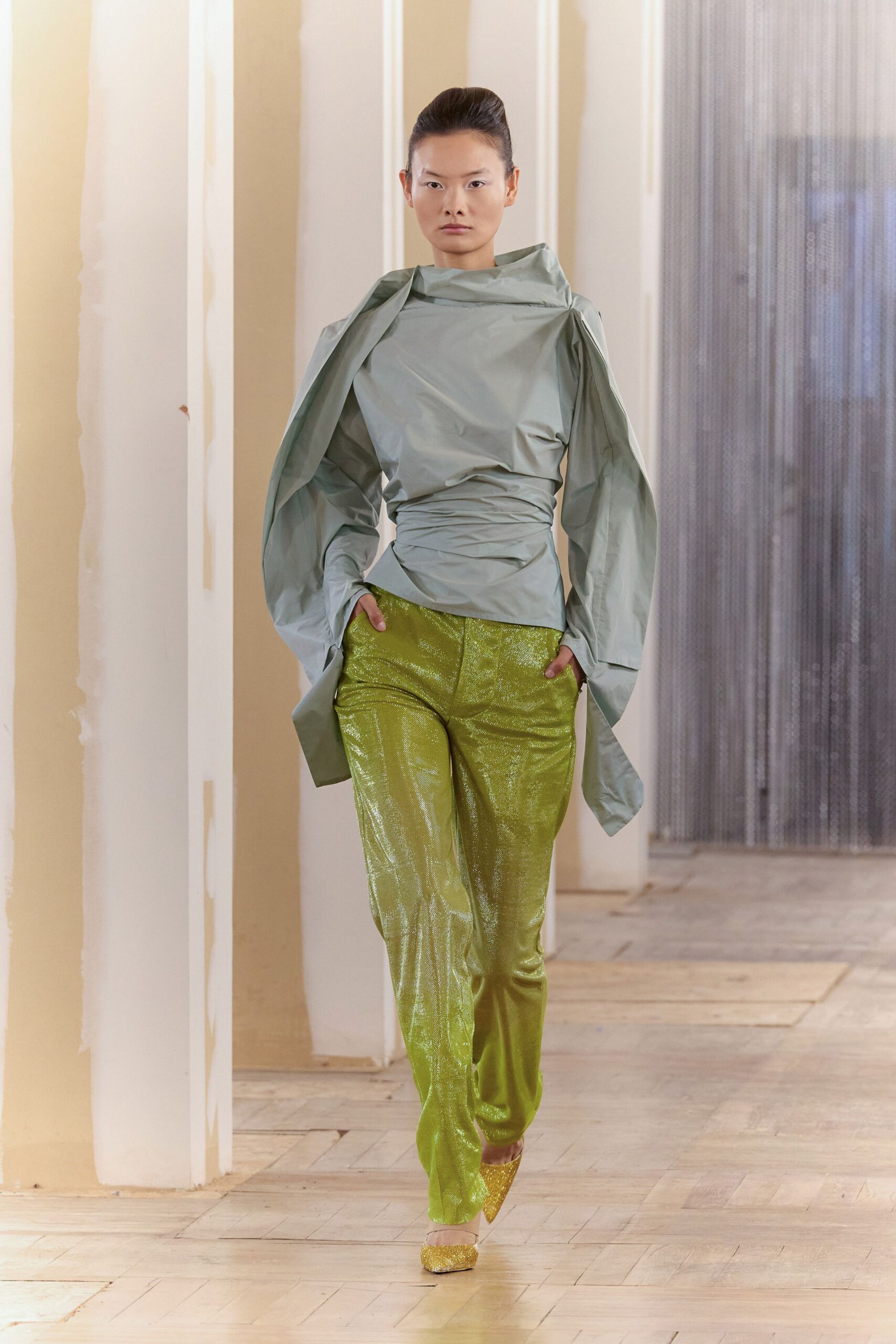 green silk fitted flared shiny pants