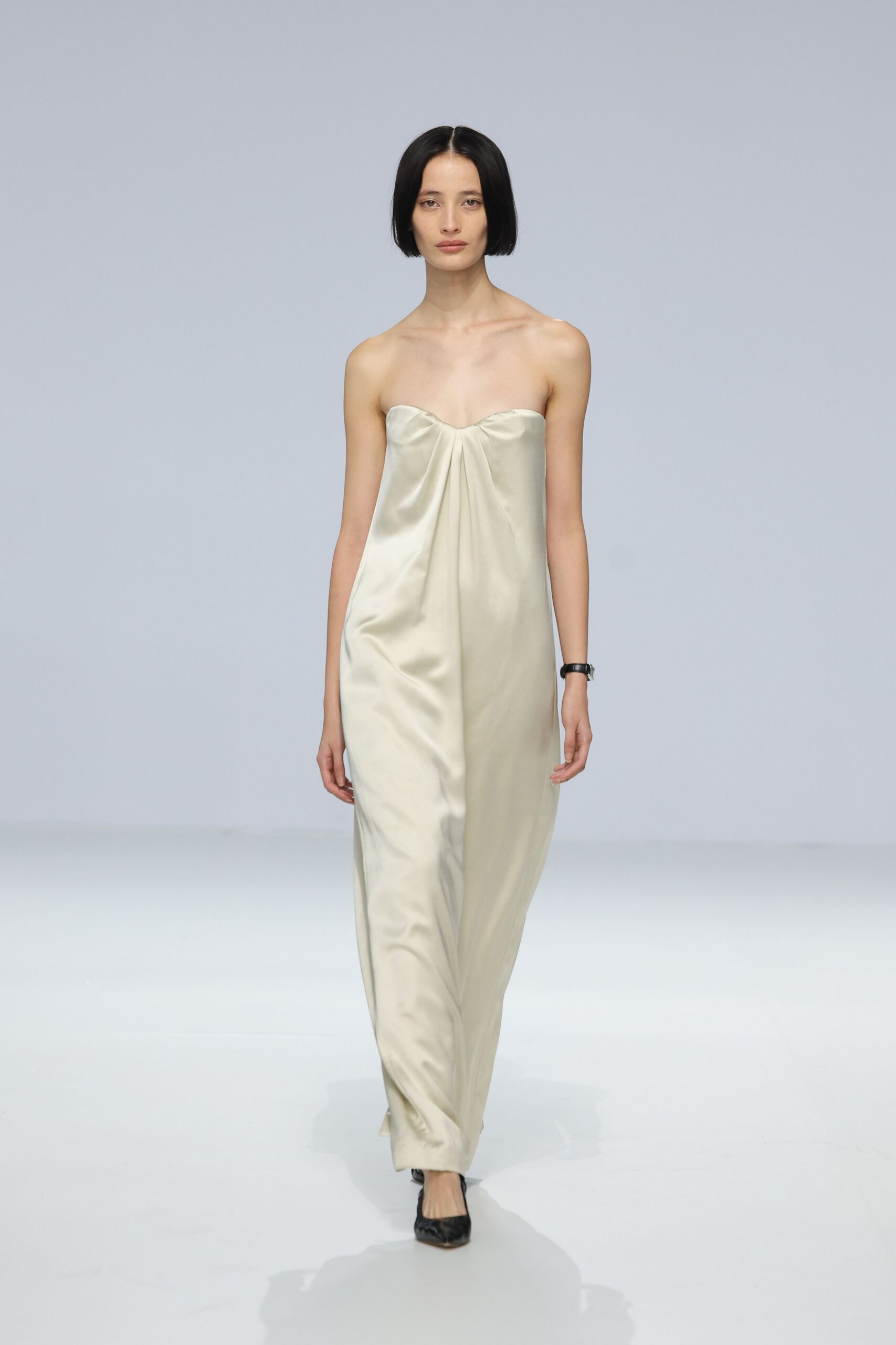 ivory silk strapless fitted draped flowing maxi gown