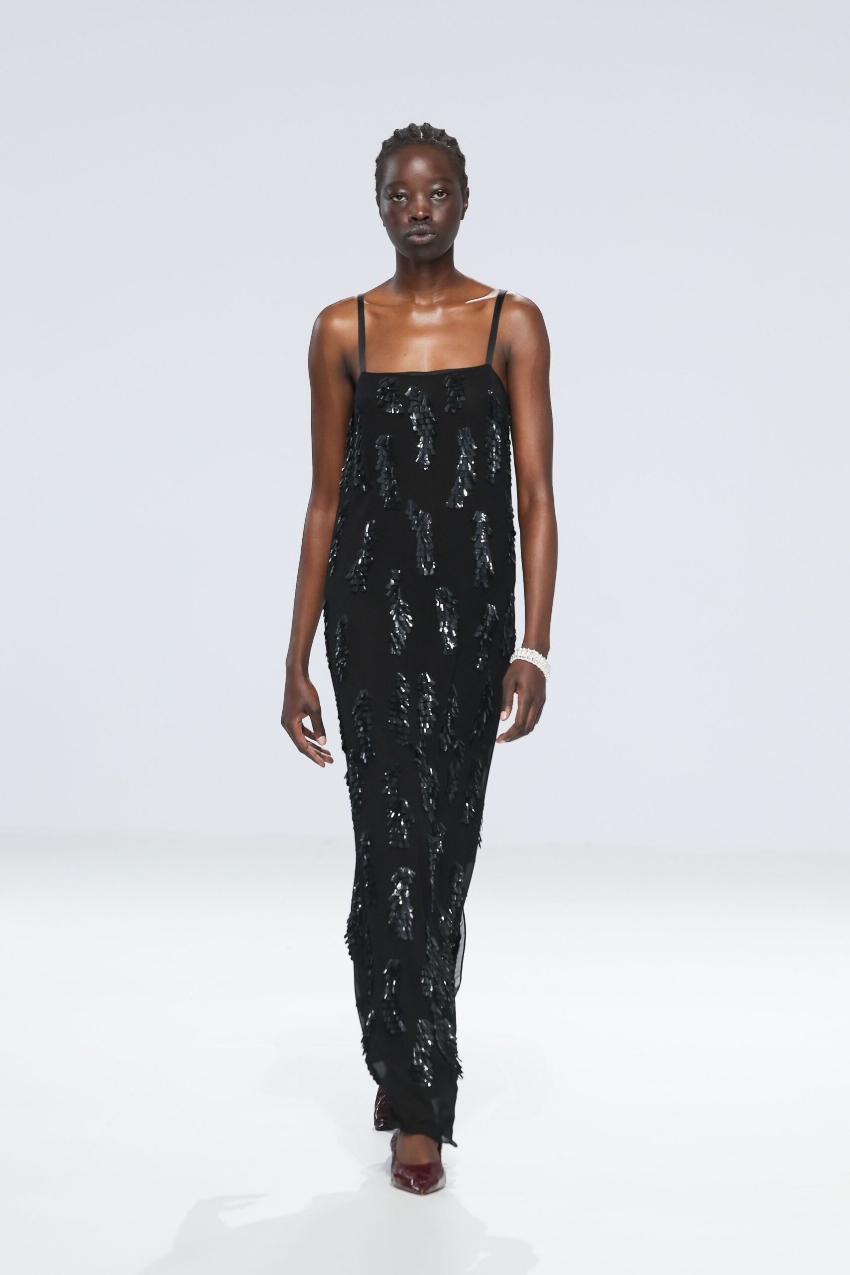 black sequin sleeveless v-neck fitted layered shiny gown