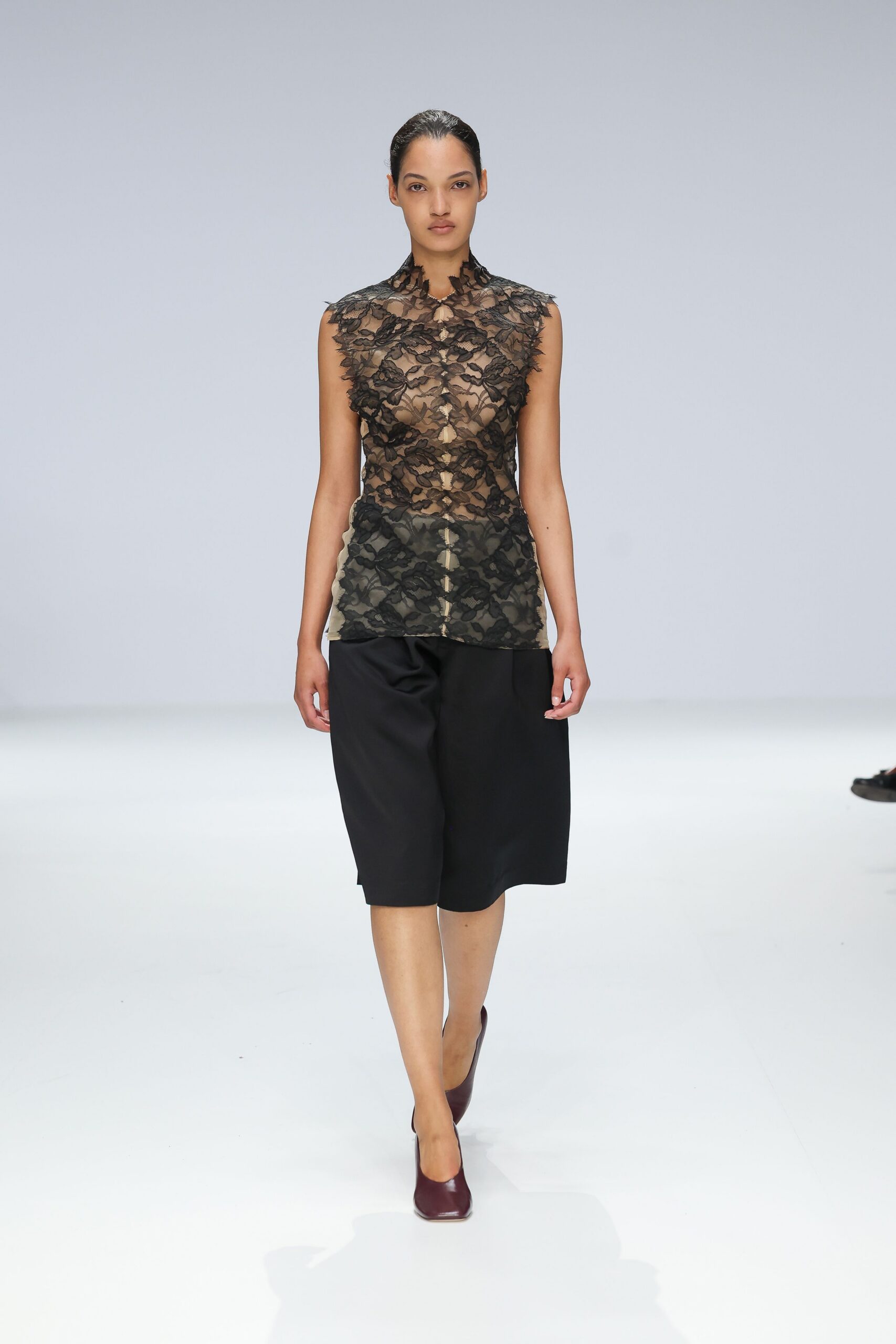 black lace sleeveless high-neck fitted layered top