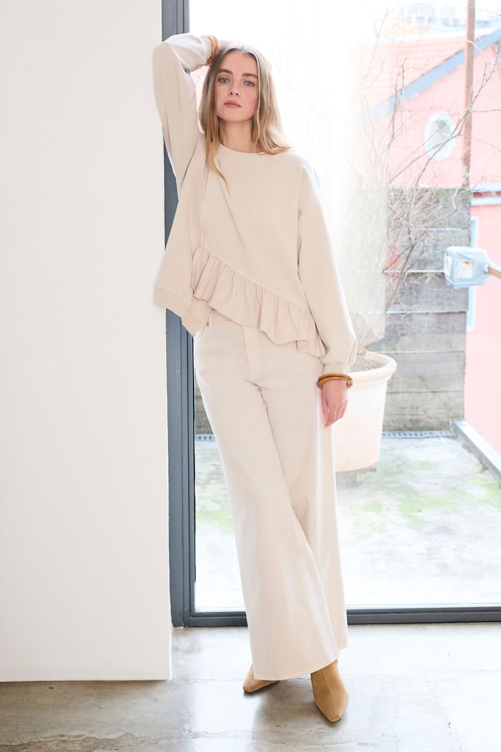 beige cotton long-sleeve relaxed ruffled sweater