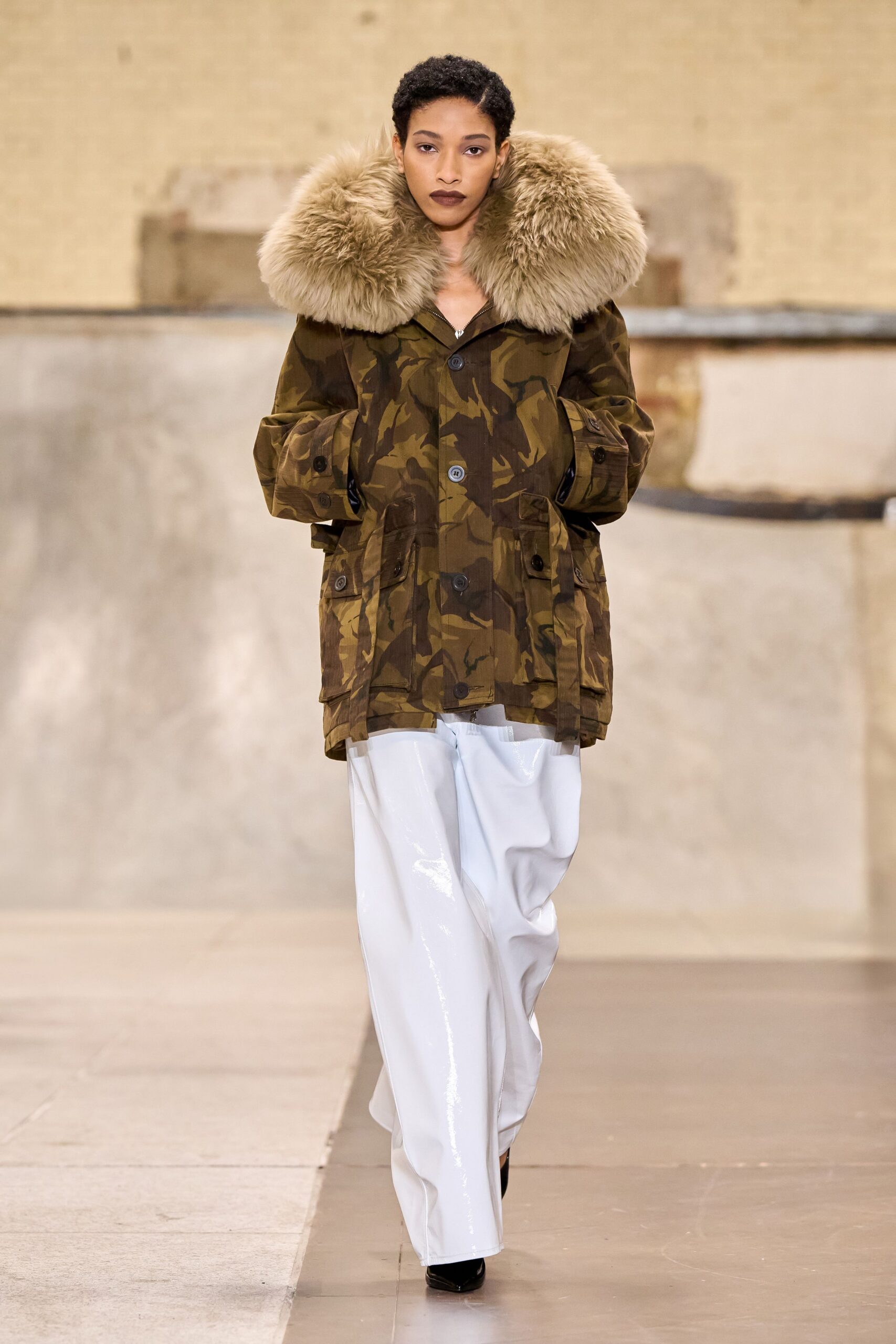 camouflage coat with vinyl pants