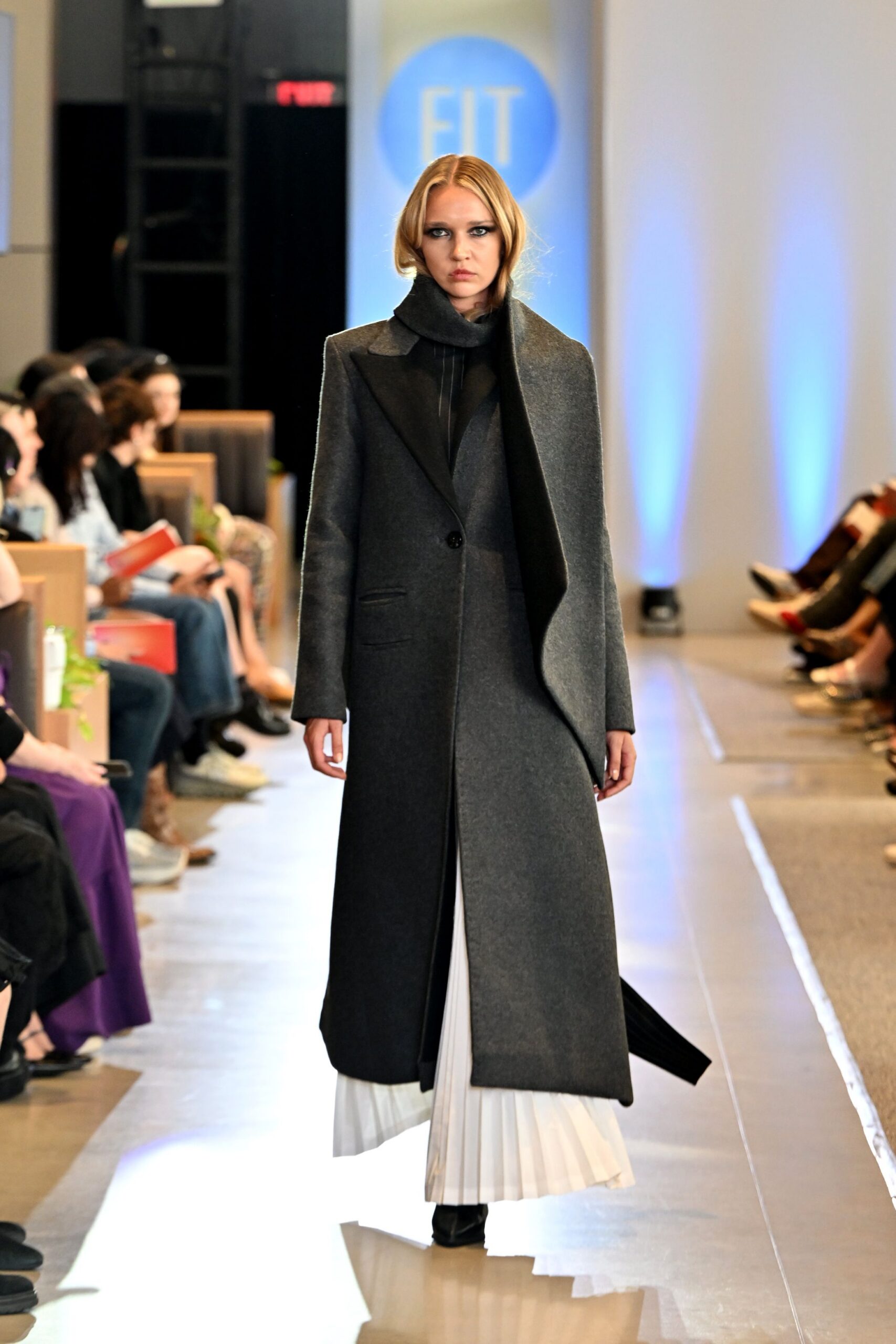 gray wool coat with white pleated dress