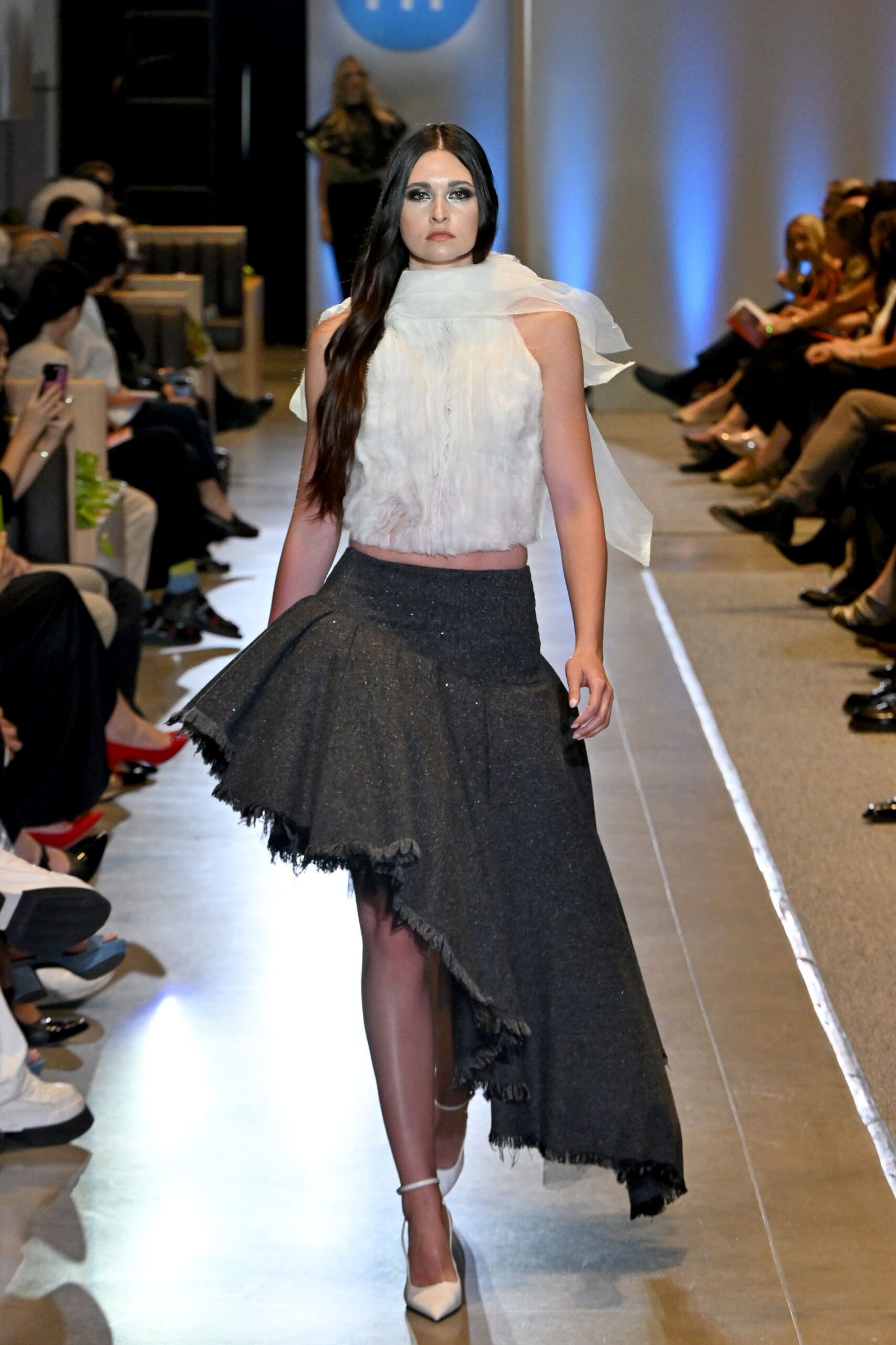 white silk fitted top with asymmetric gray skirt