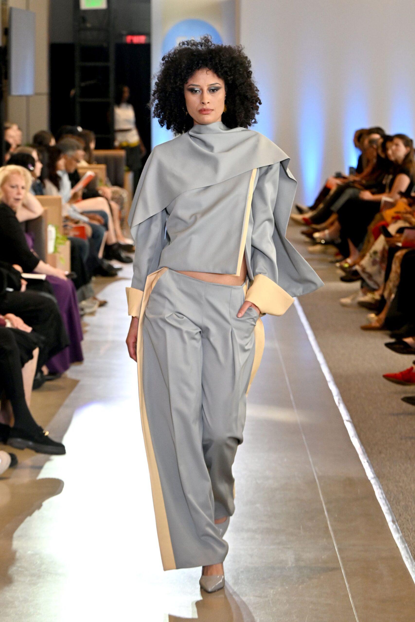 gray relaxed top with beige pants