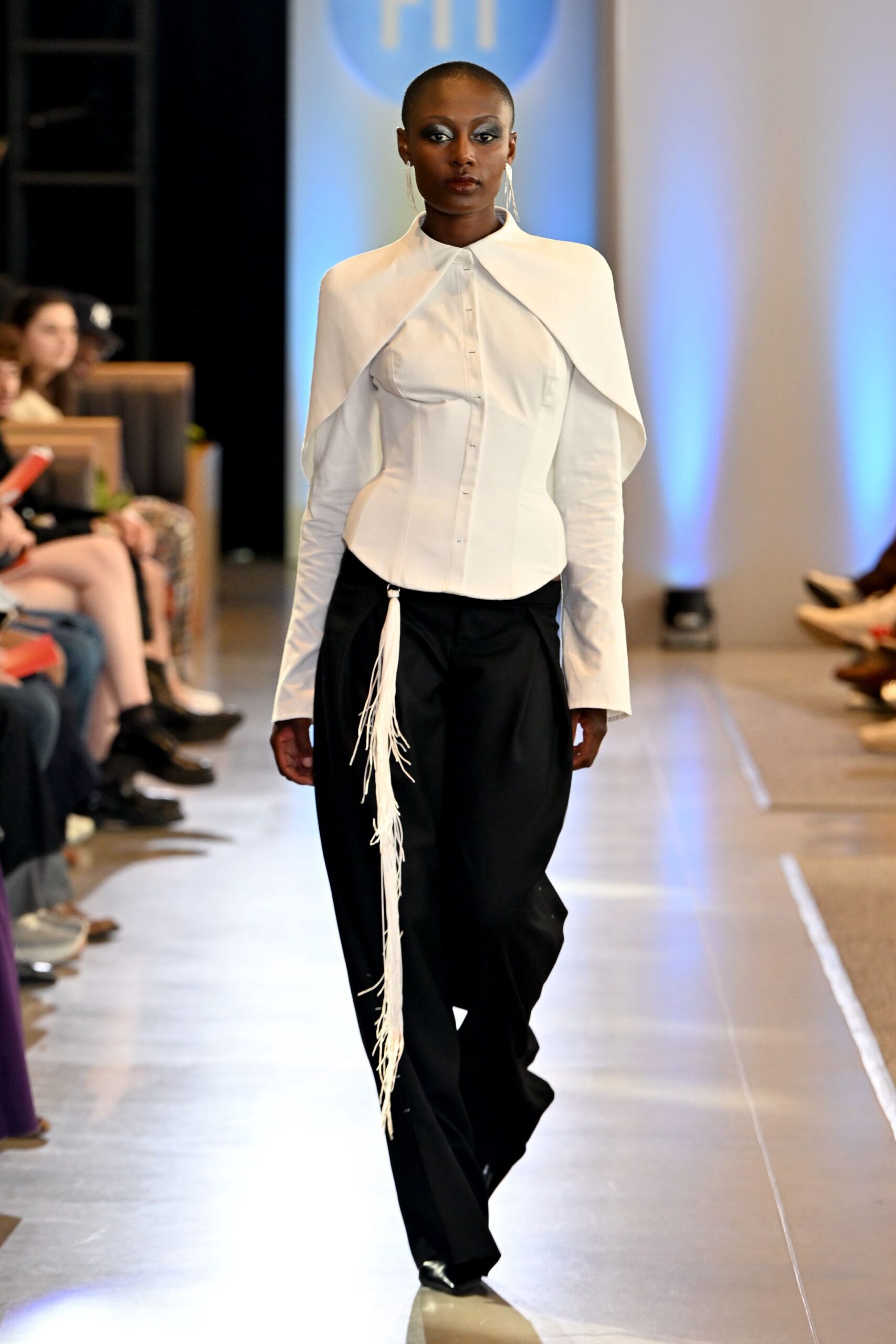 white asymmetric shirt with black pants