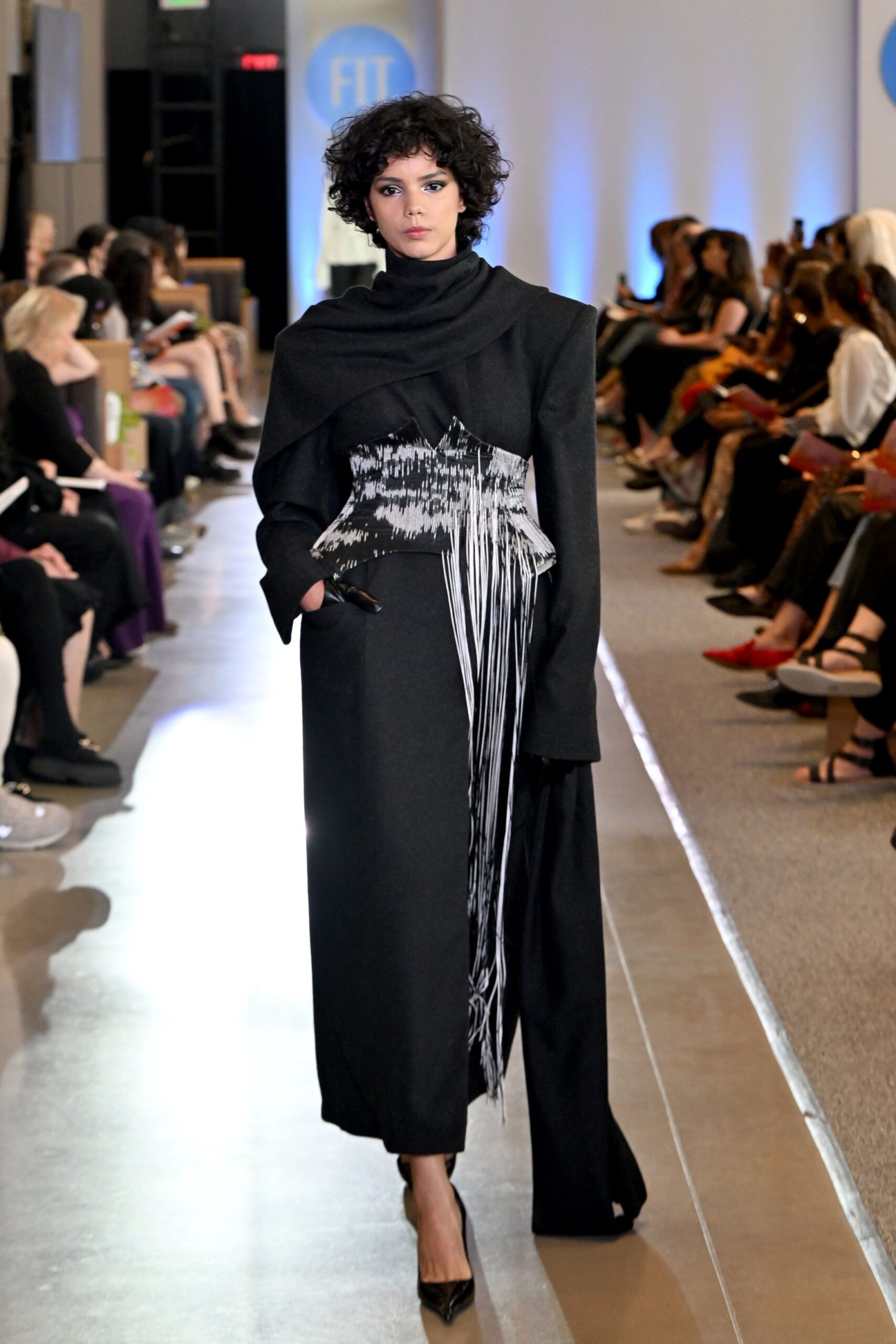 black fitted maxi dress with draped detail