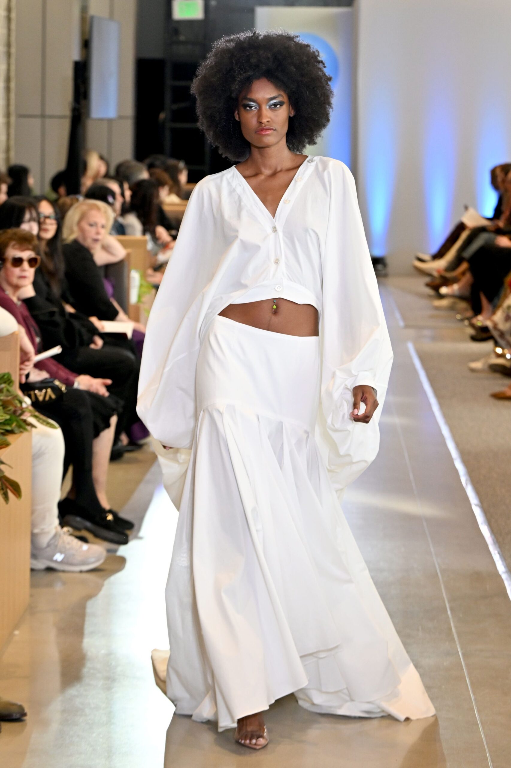 white relaxed top and flared skirt