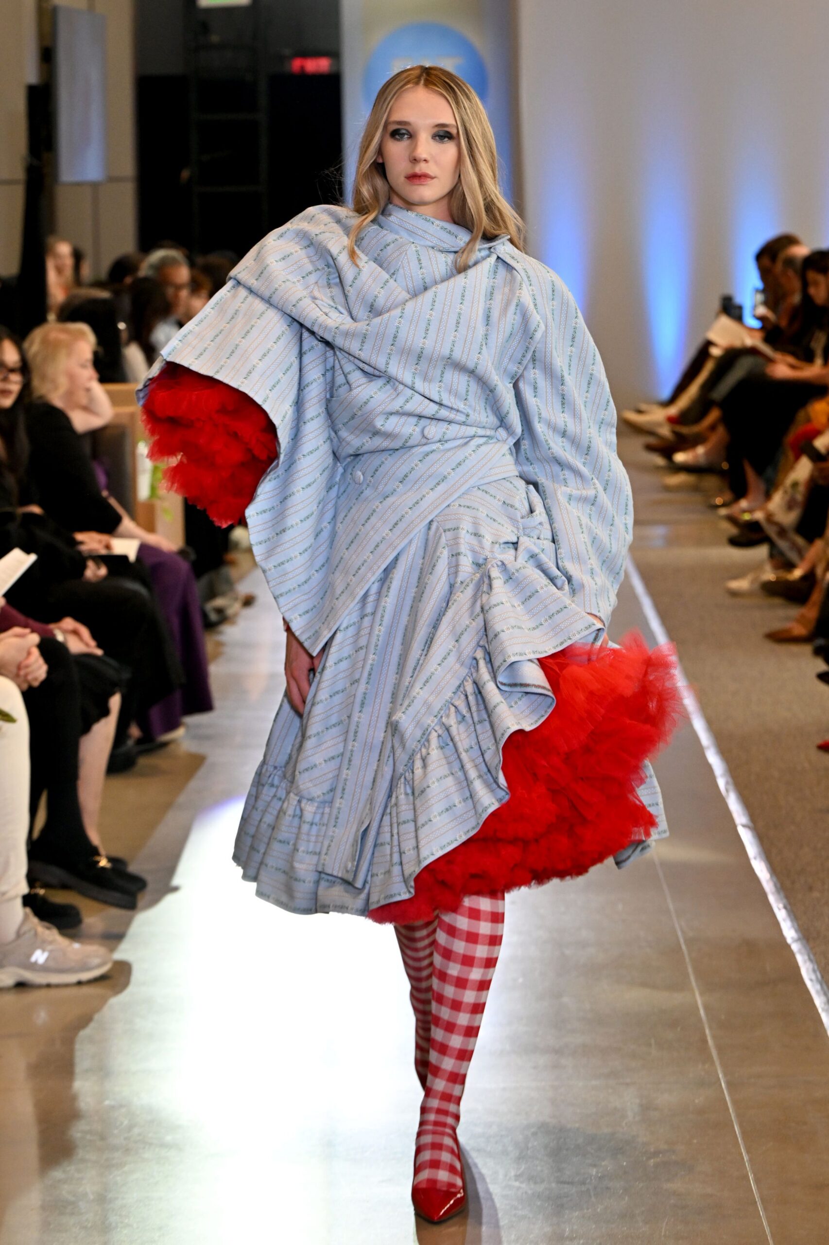 blue pleated midi dress with red shoes