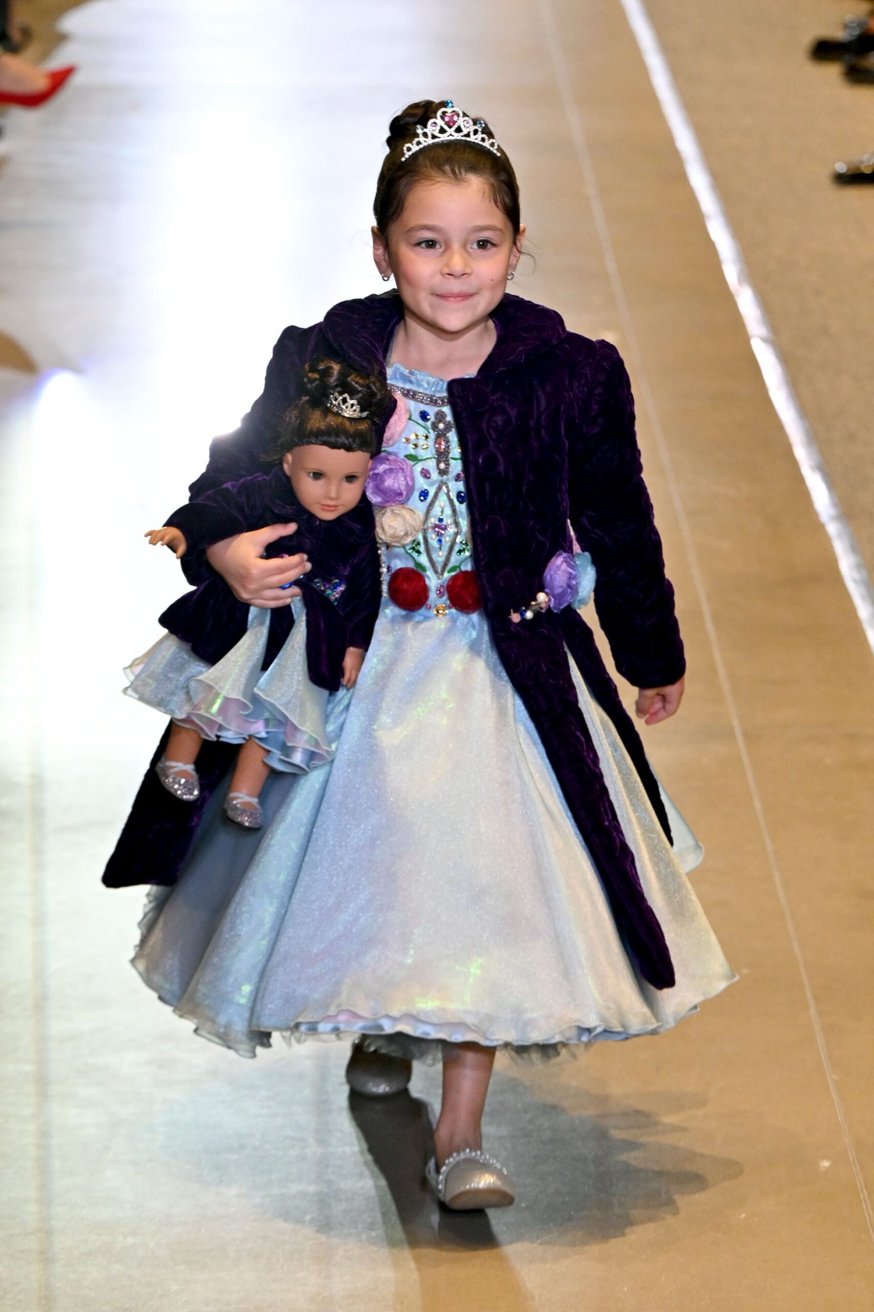 light blue satin dress with purple coat