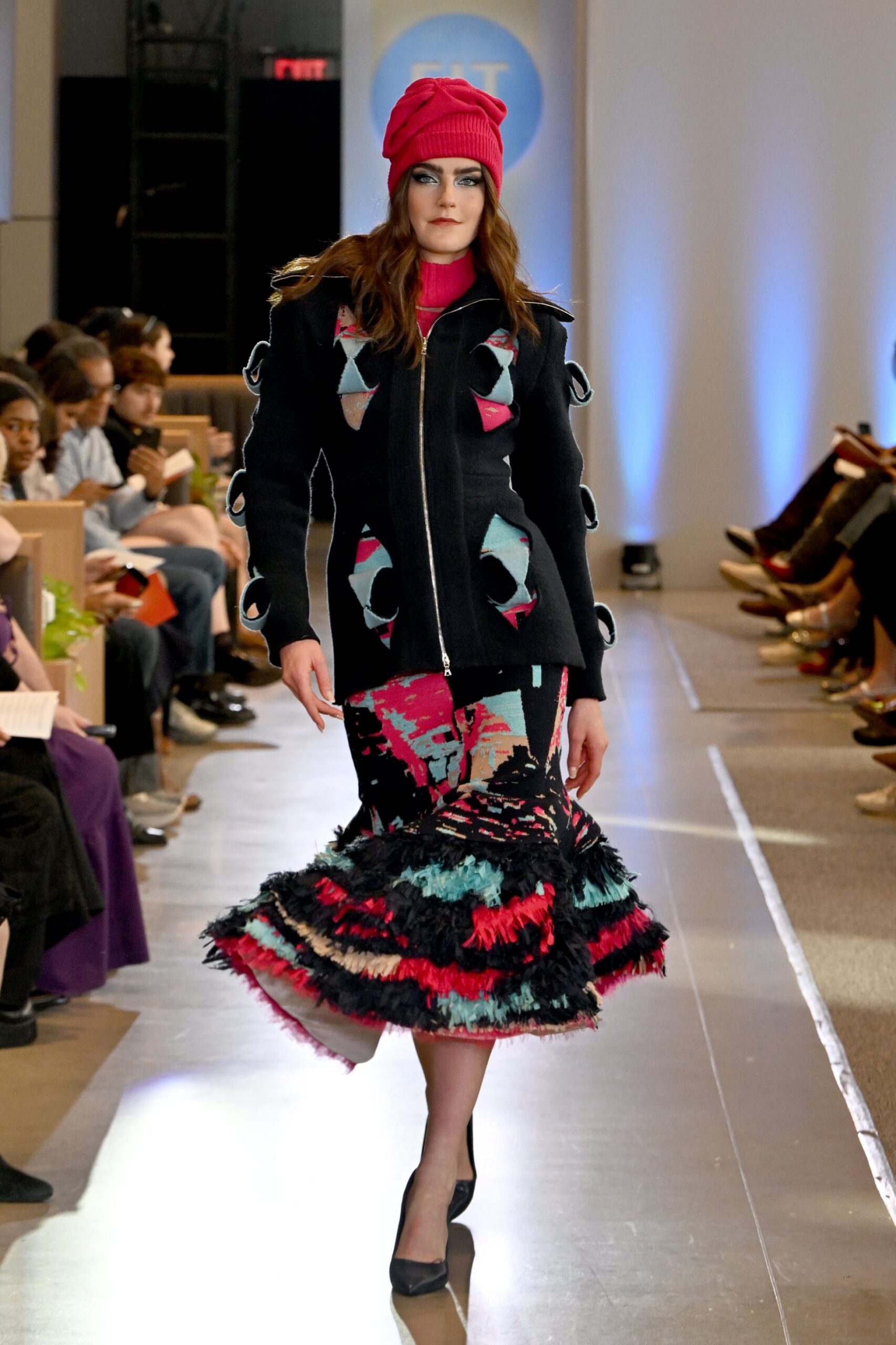 fitted black jacket with tiered skirt