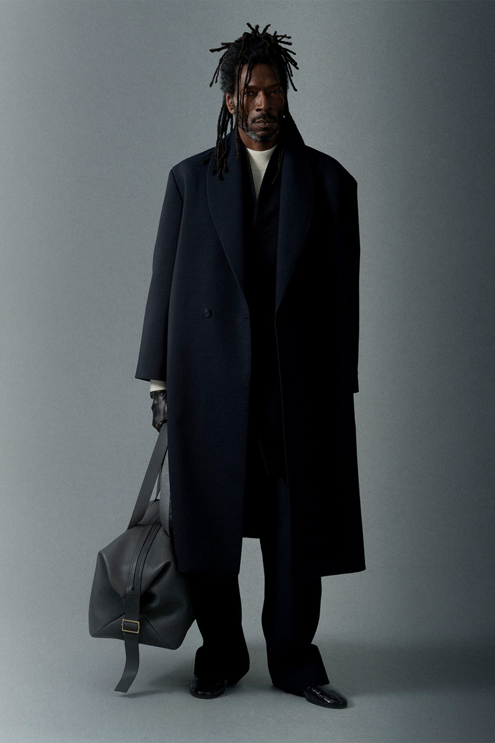 black wool long-sleeve collared oversized coat