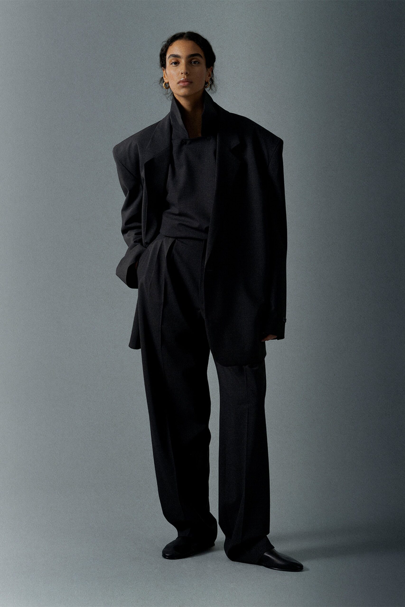 black wool tailored pleated pants