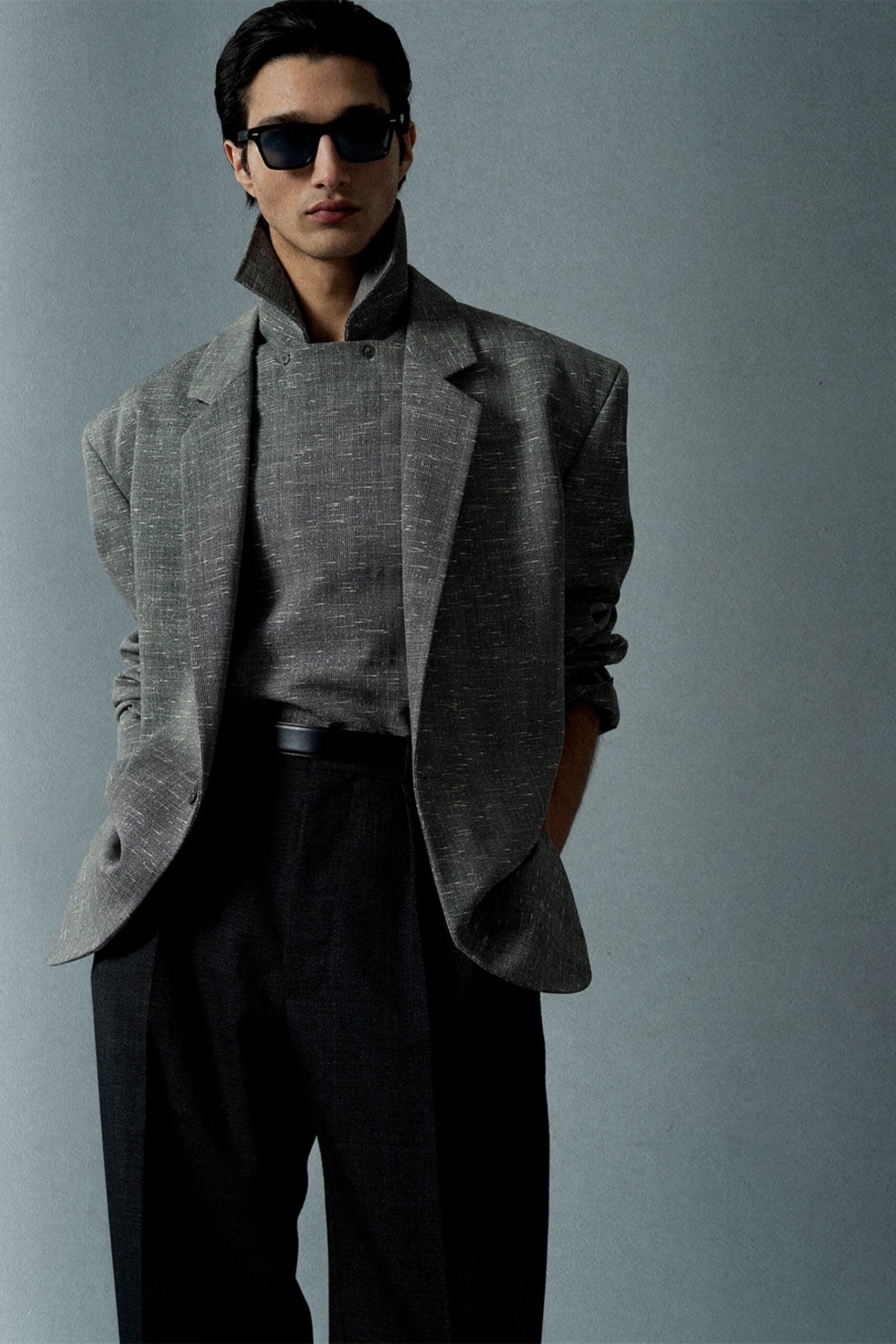 gray oversized blazer with black pants