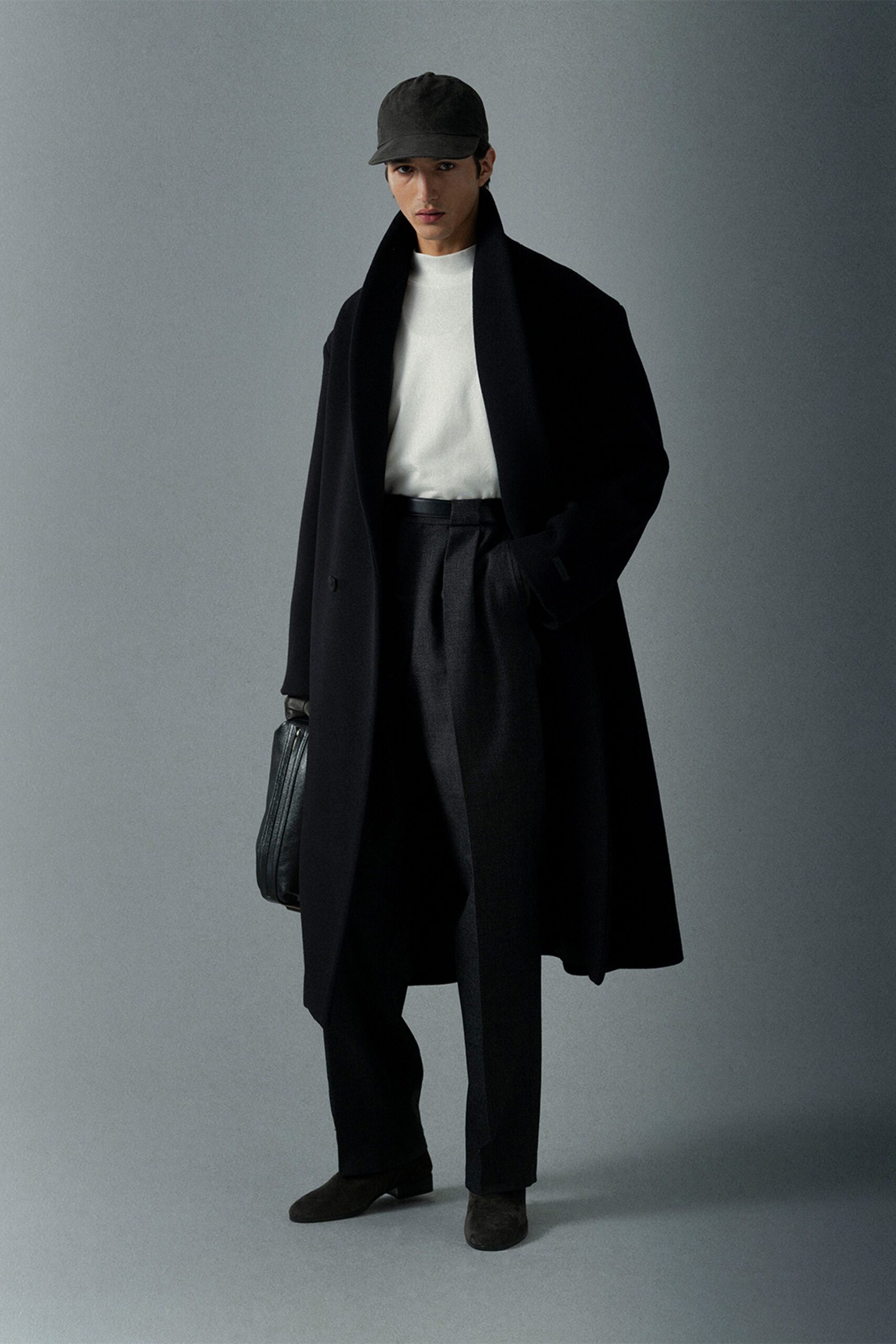 black wool coat with gray pants