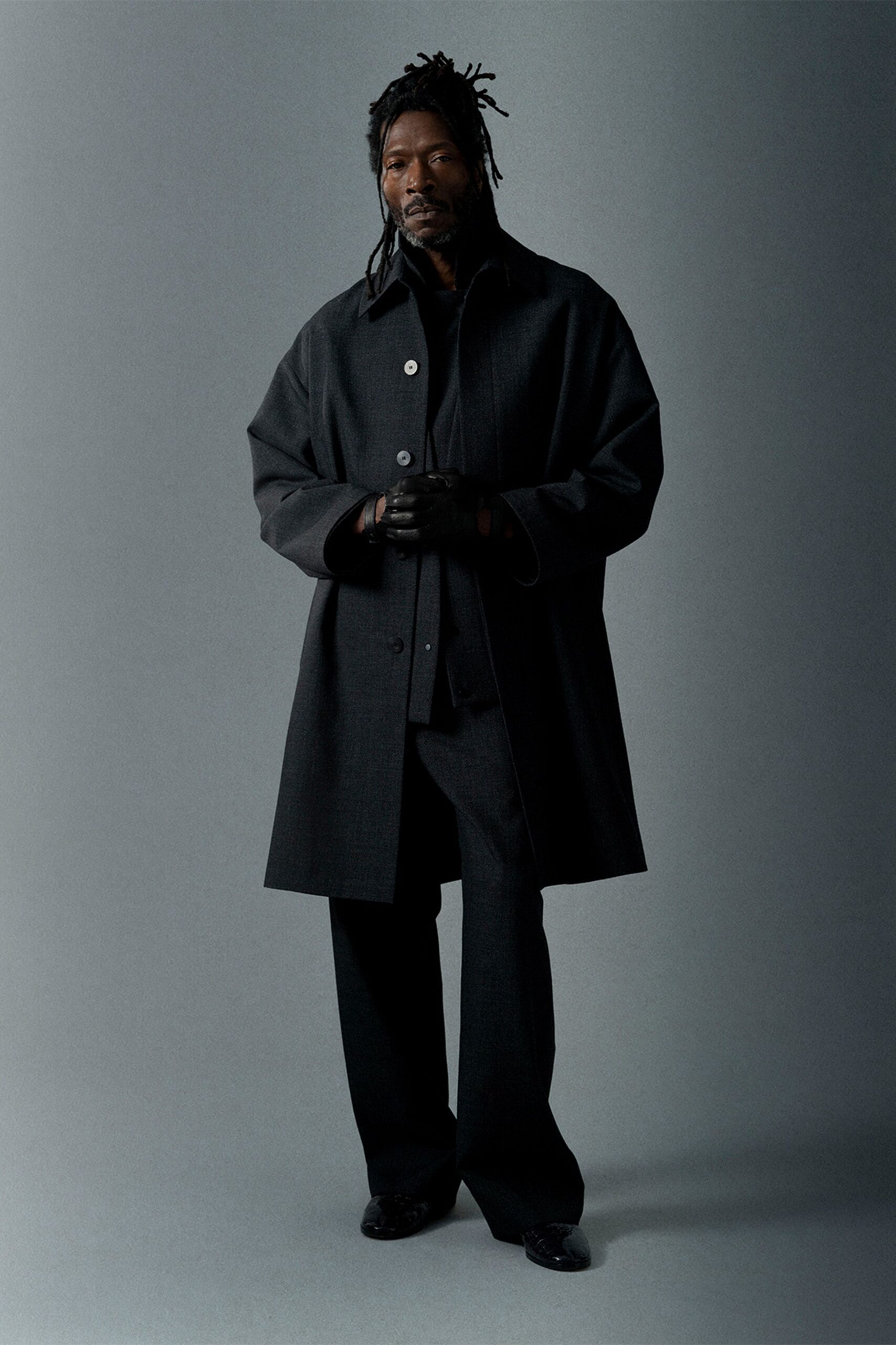 black wool coat with tailored pants
