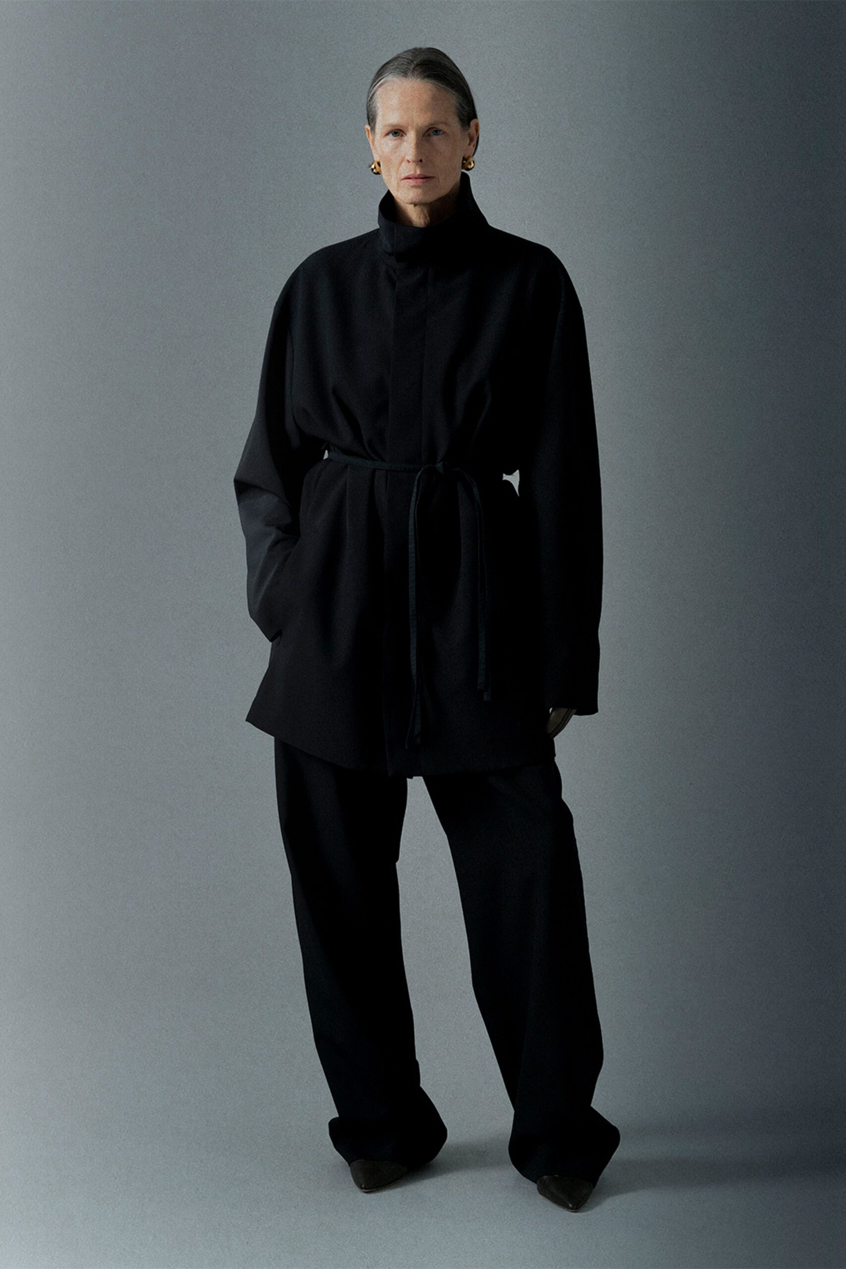 black wool belted coat and pants