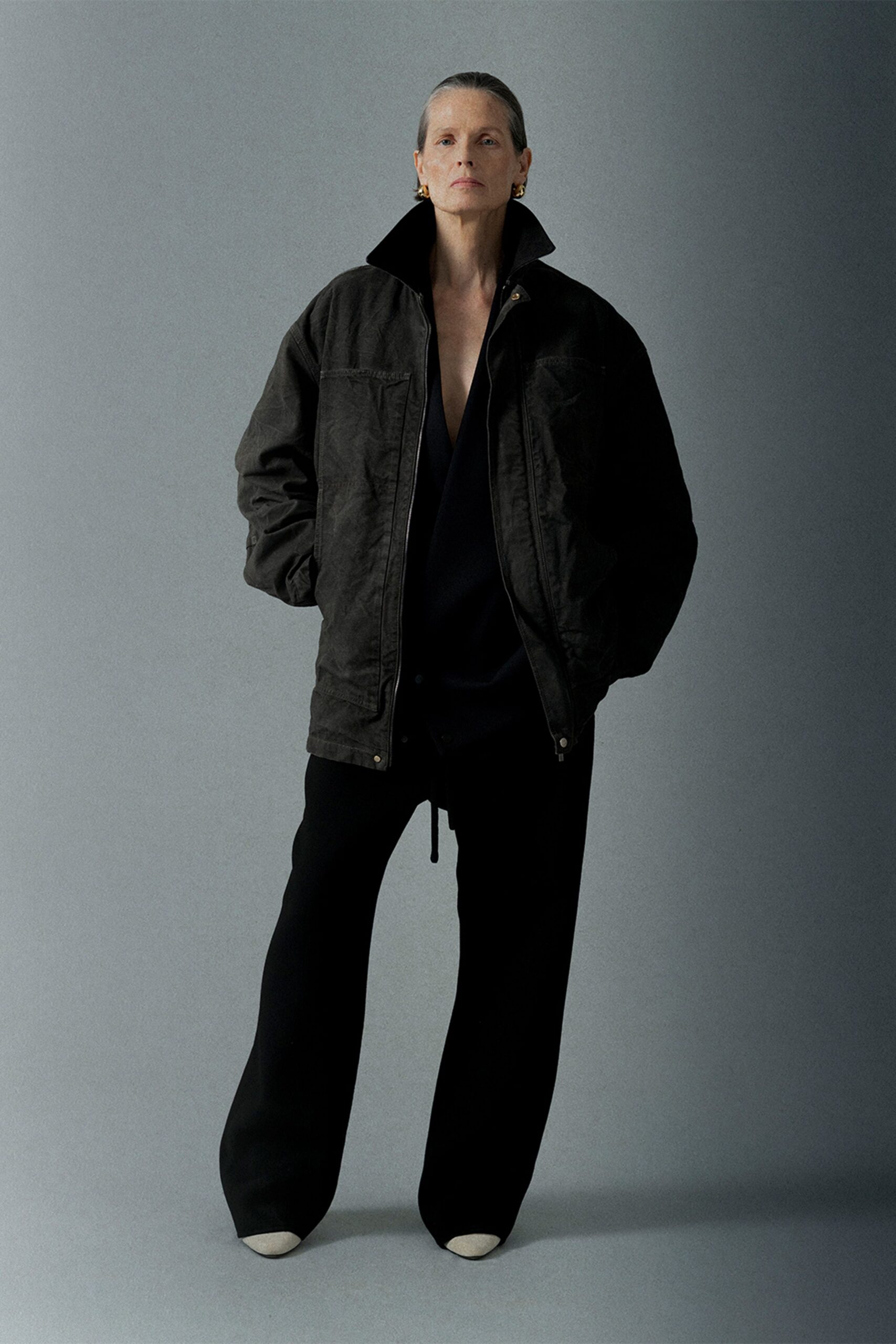 black relaxed jacket with fitted top and wide-leg pants
