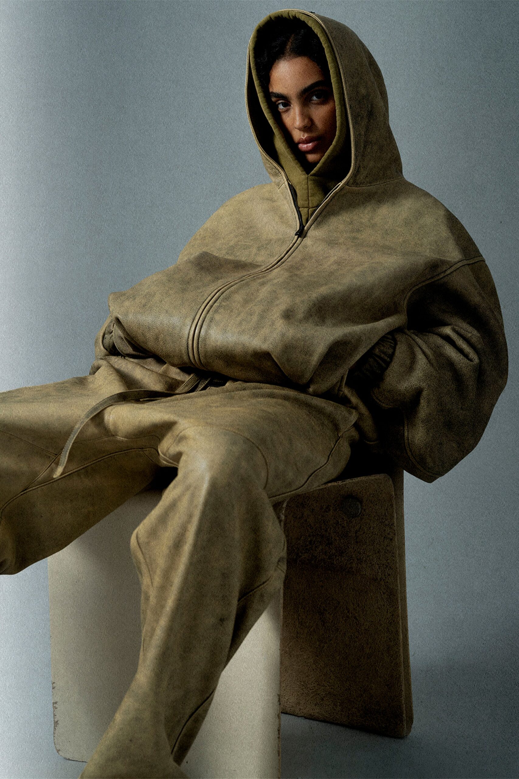 brown oversized hoodie and relaxed pants
