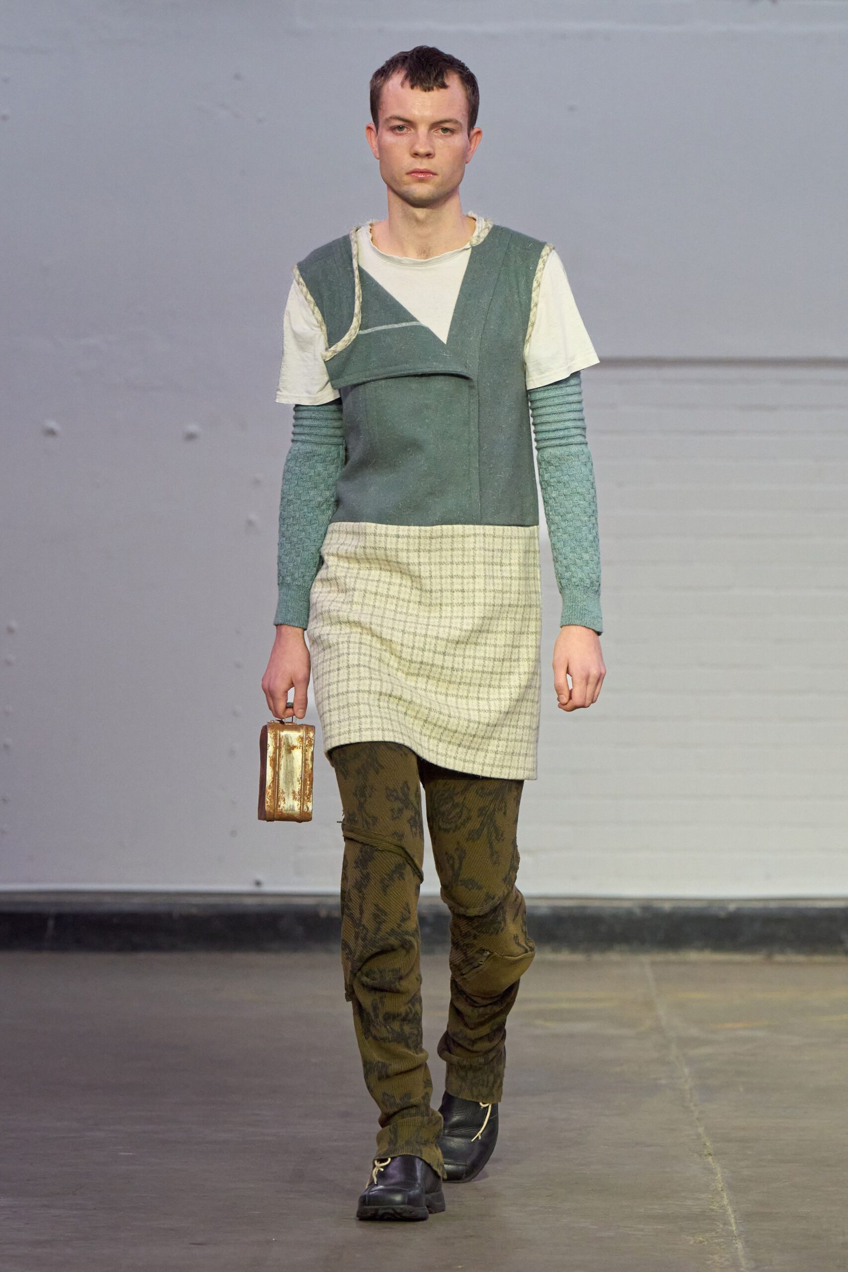 green vest white top beige skirt