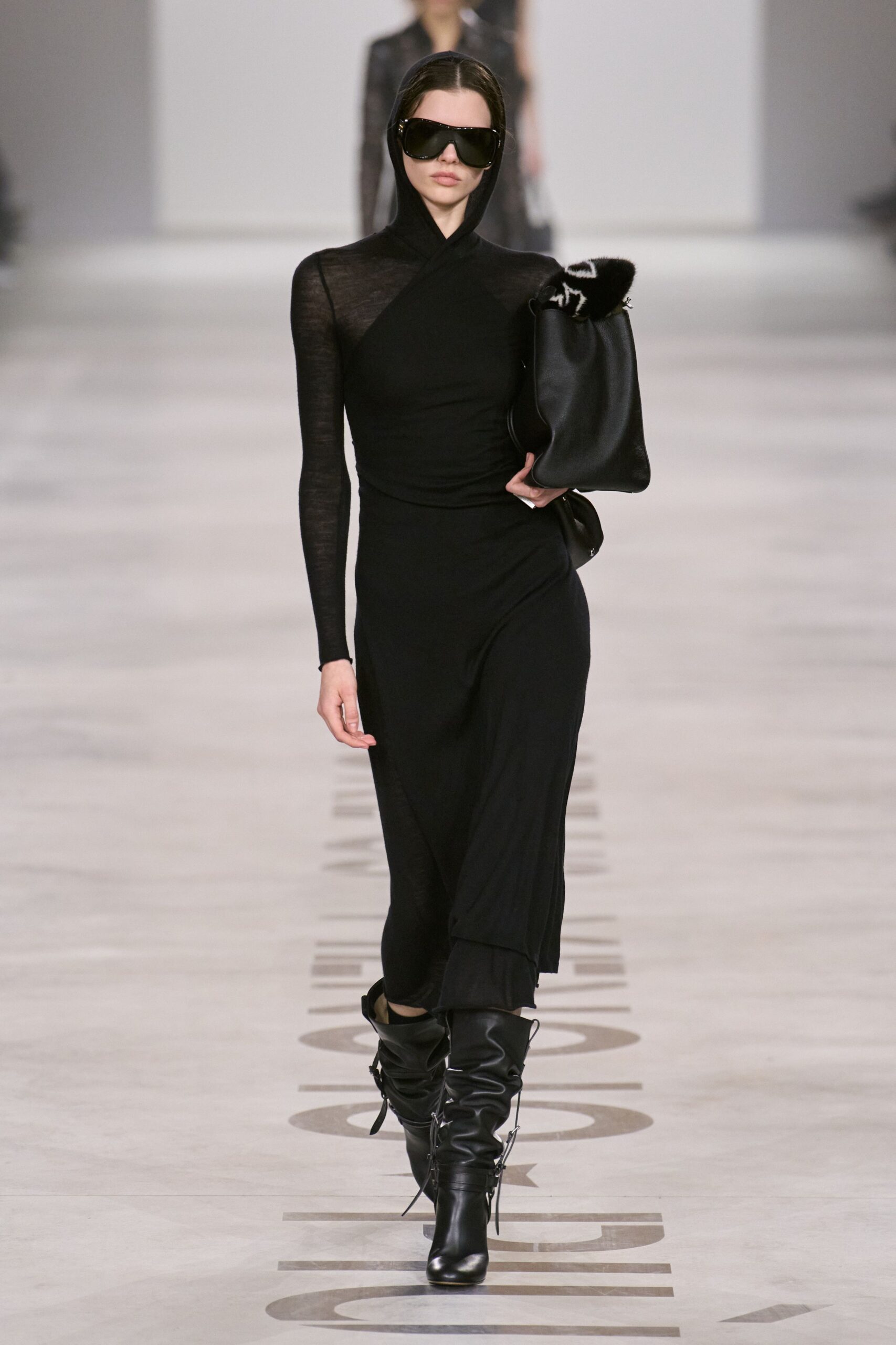 black fitted midi dress with boots