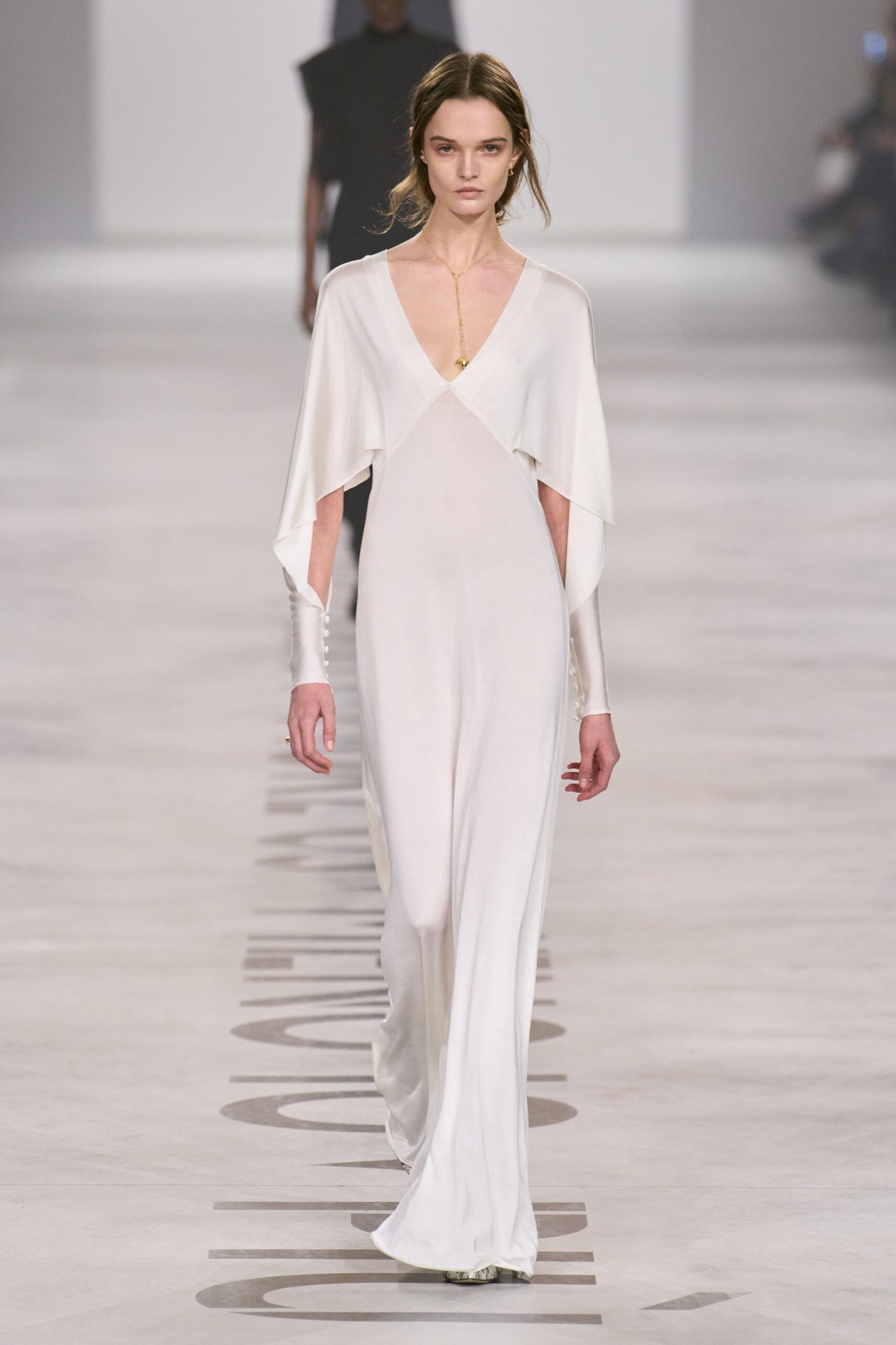 white silk sleeveless gown