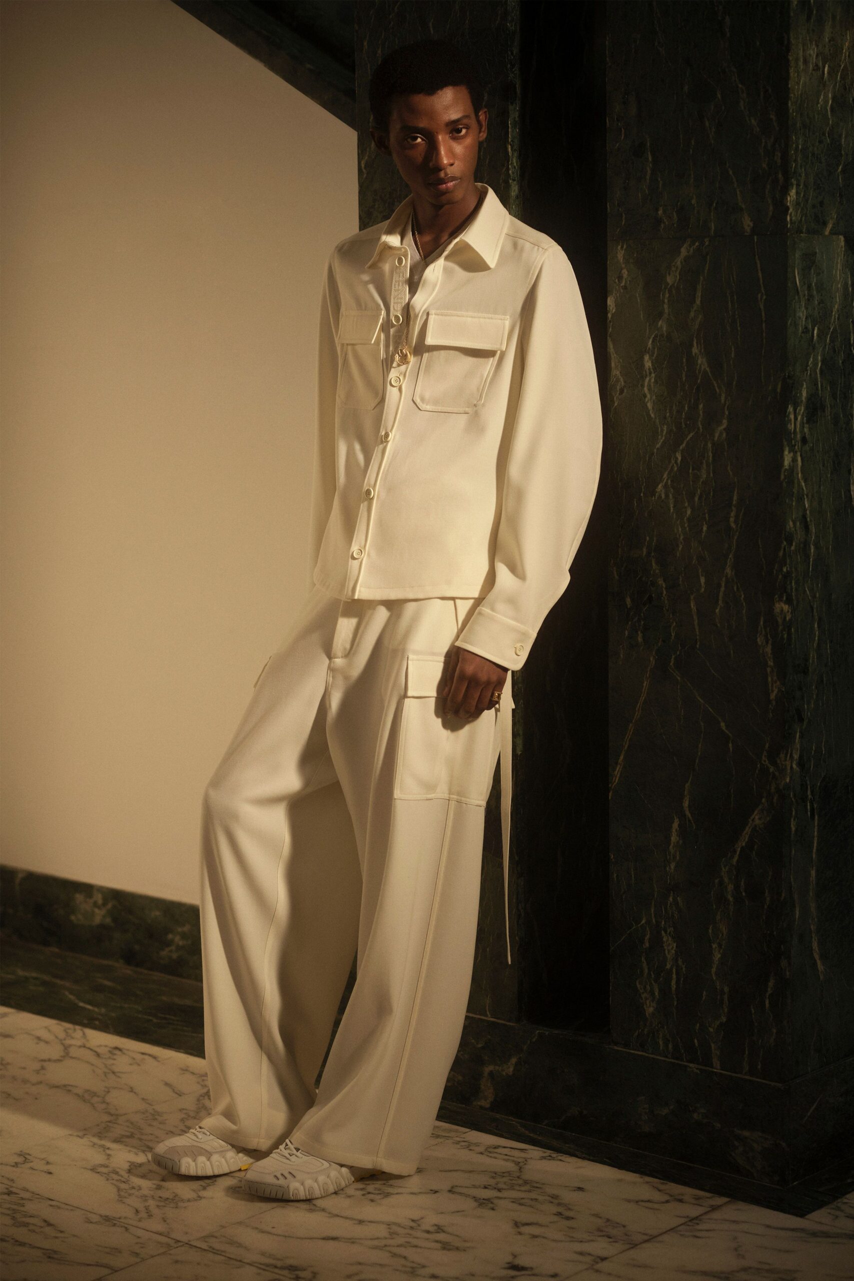 white cotton long-sleeve collared relaxed buttoned pockets shirt