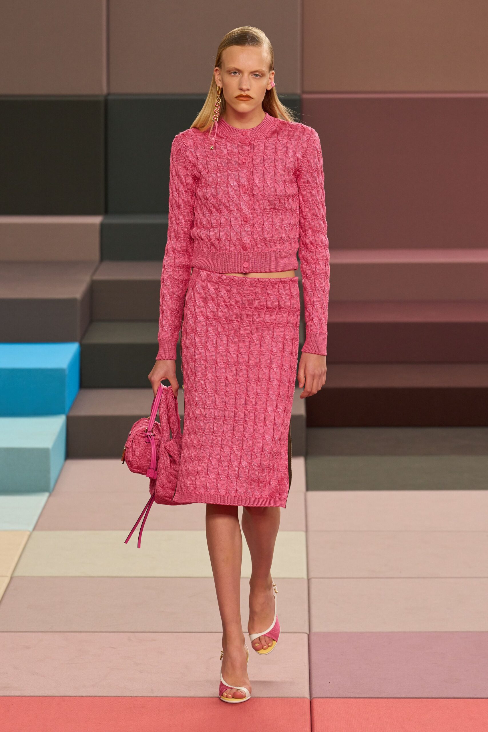 pink knitted cardigan and skirt