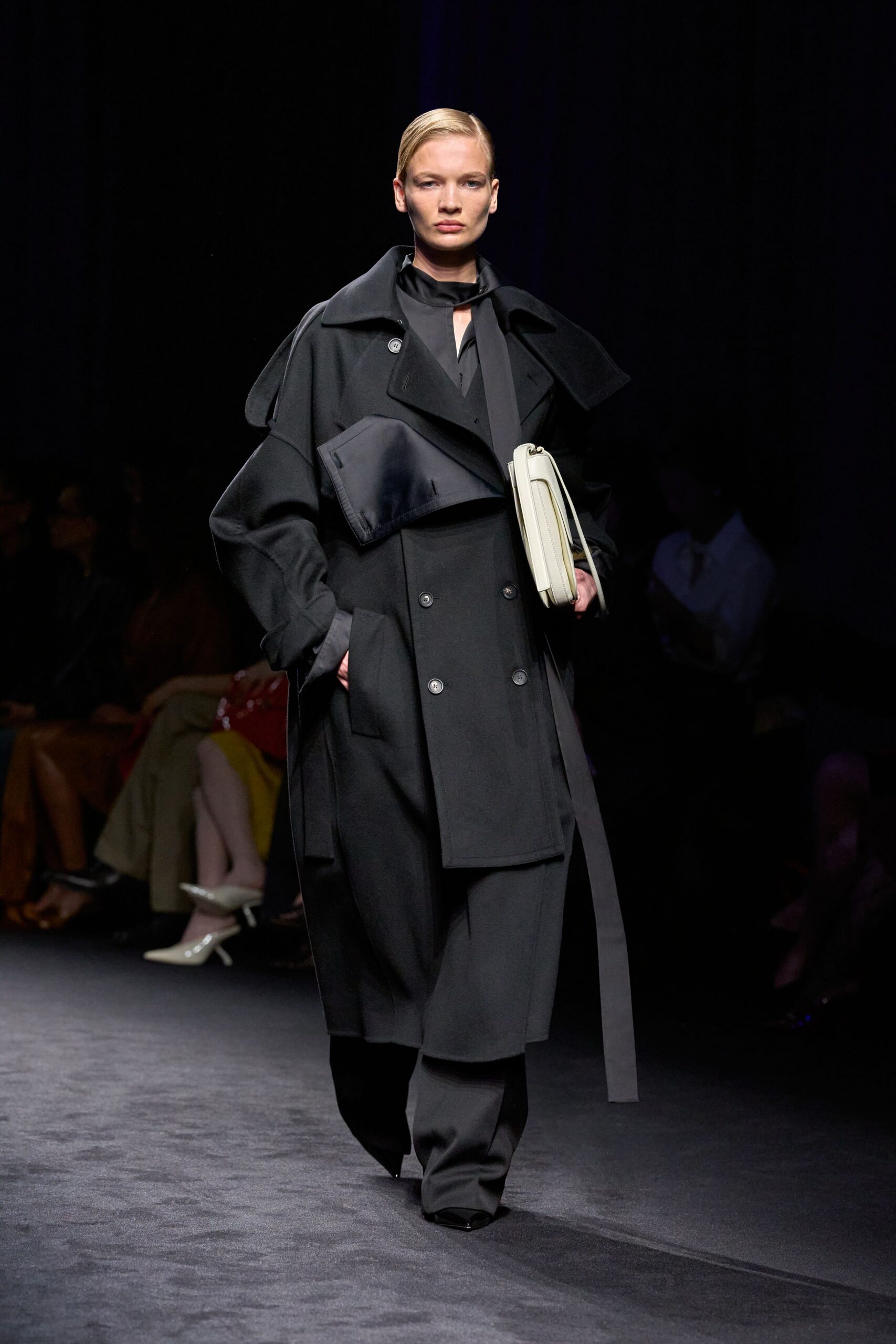 black wool long-sleeve collared oversized layered pockets coat