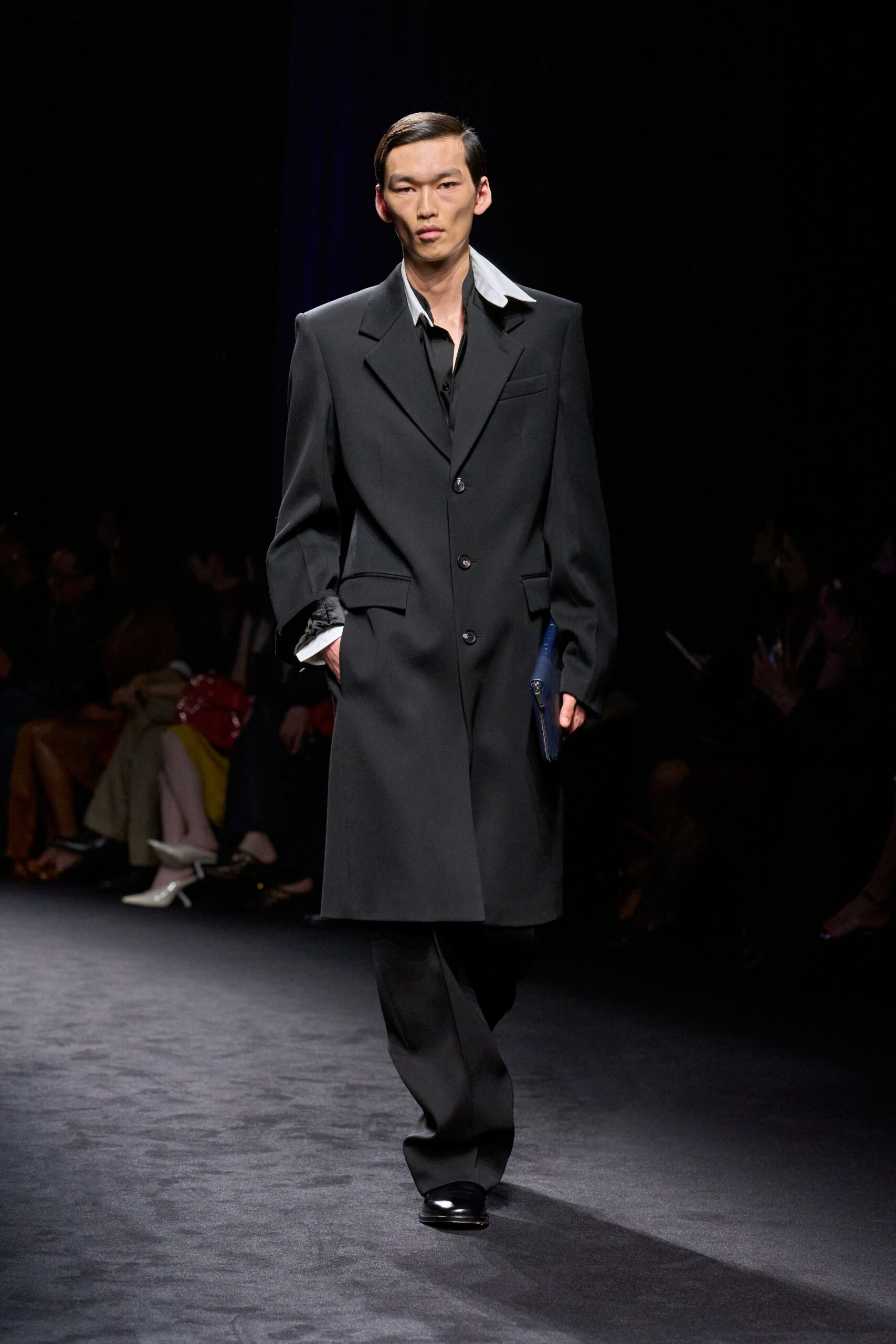 black wool long-sleeve collared structured buttoned coat