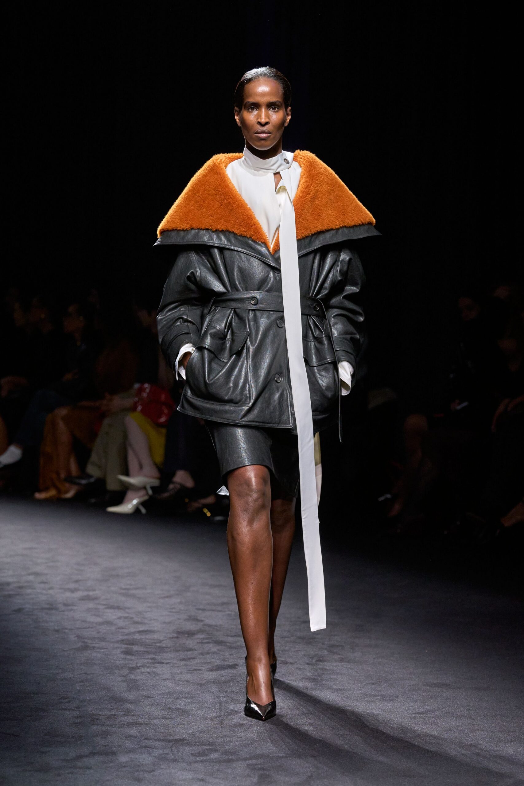 black leather long-sleeve collared relaxed zippered coat