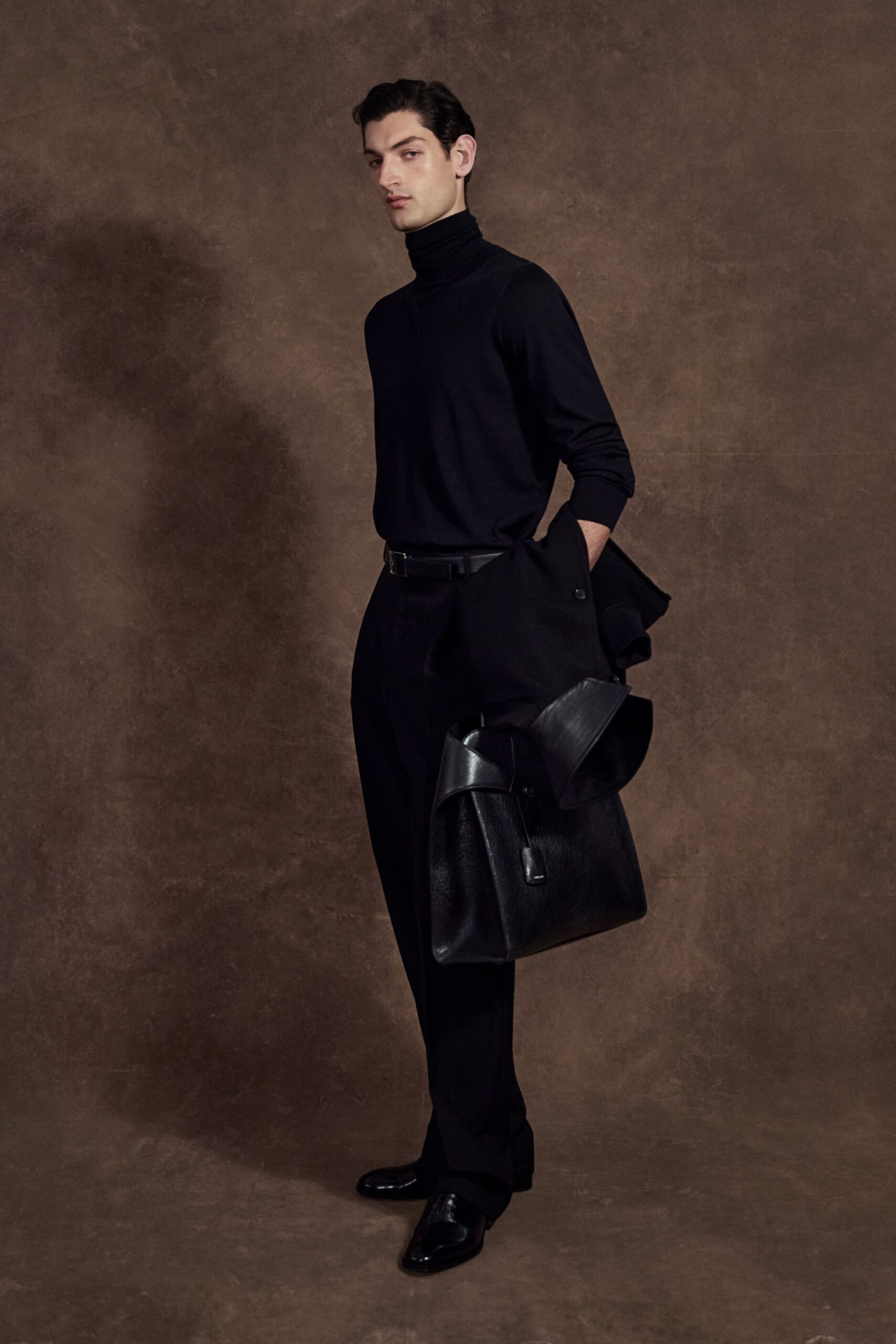 black fitted top and tailored pants