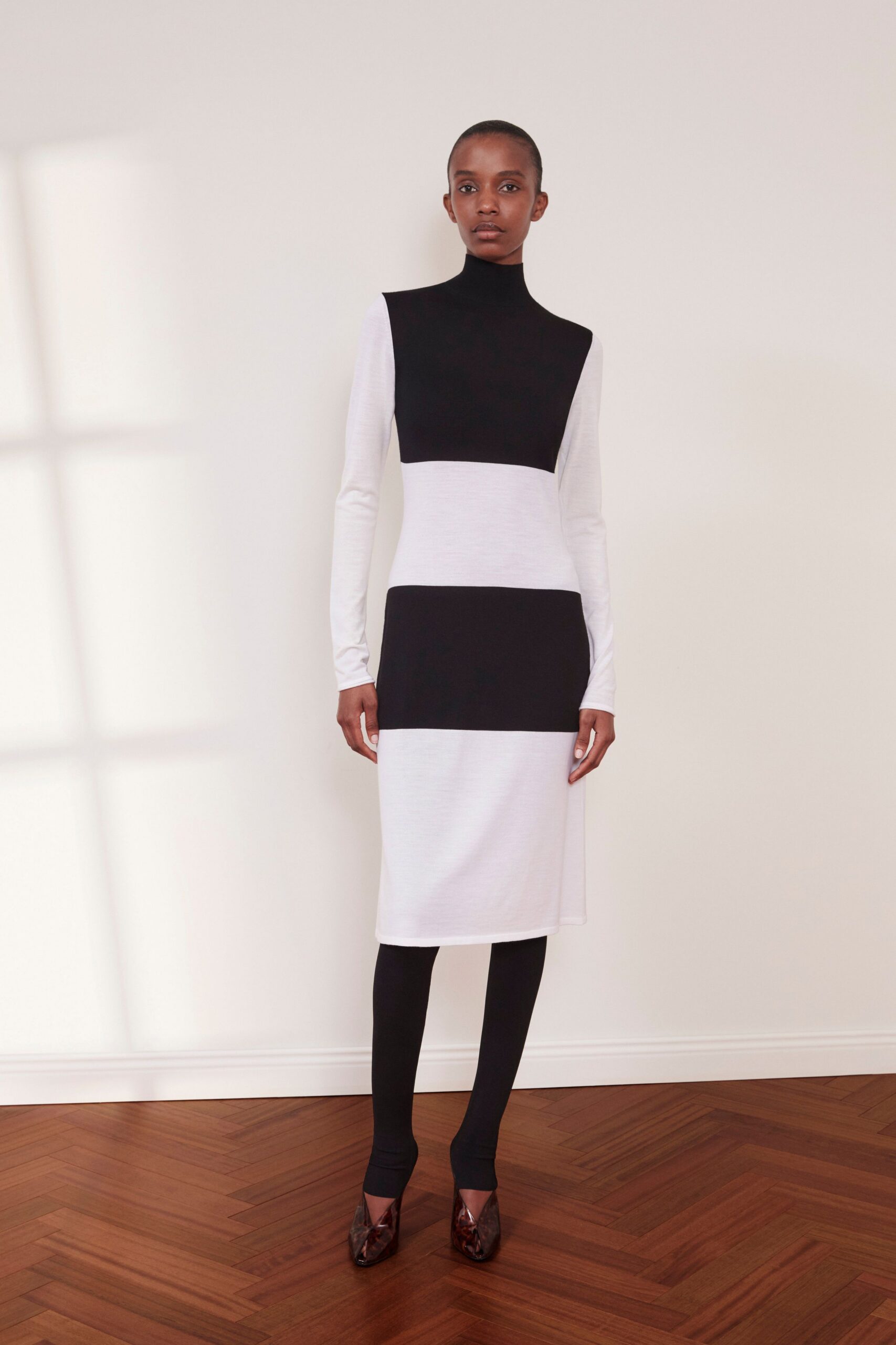 black cotton long-sleeve turtleneck fitted color-blocked midi dress