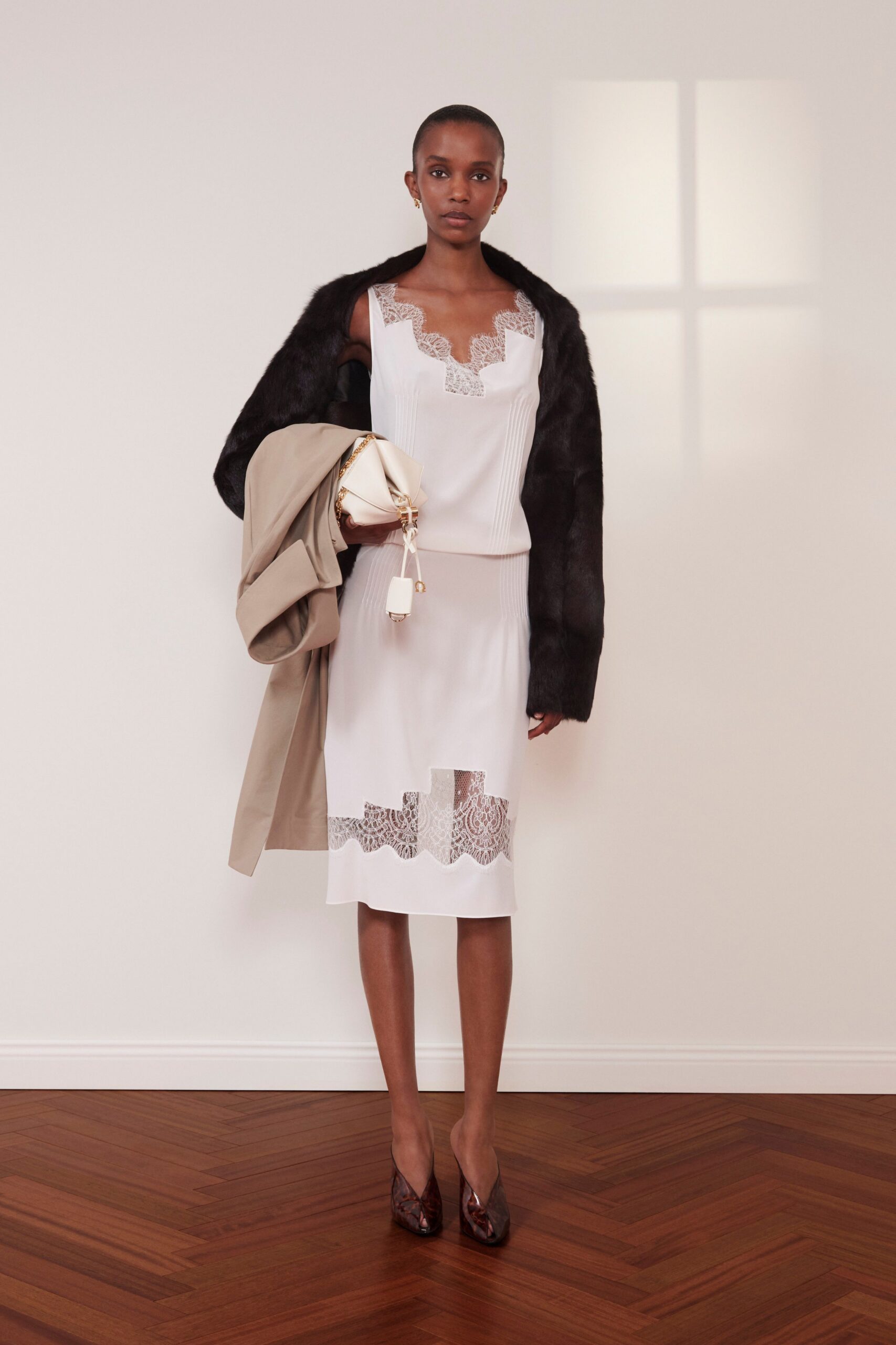white silk sleeveless v-neck fitted pleated embroidered dress