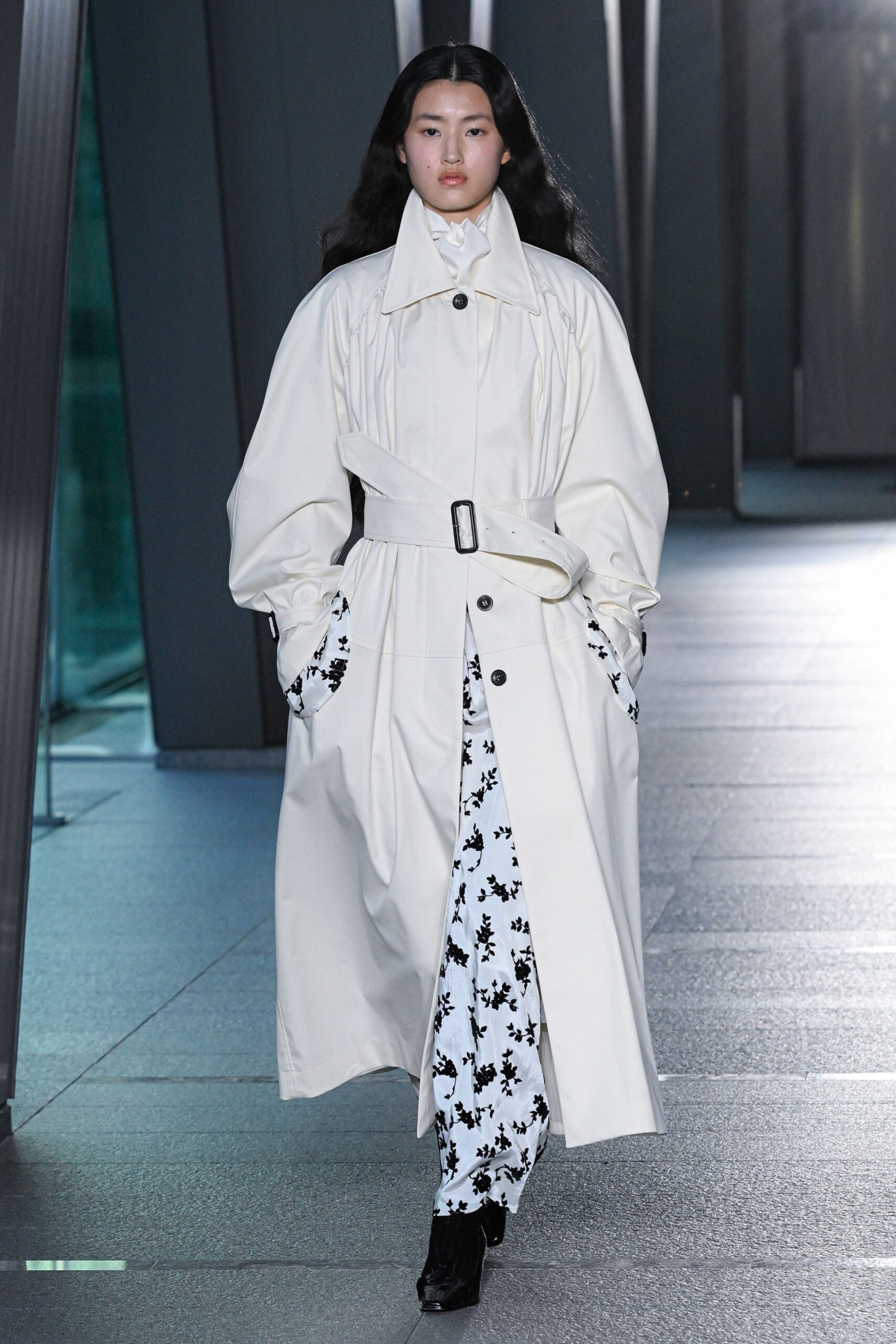 white relaxed coat with floral dress