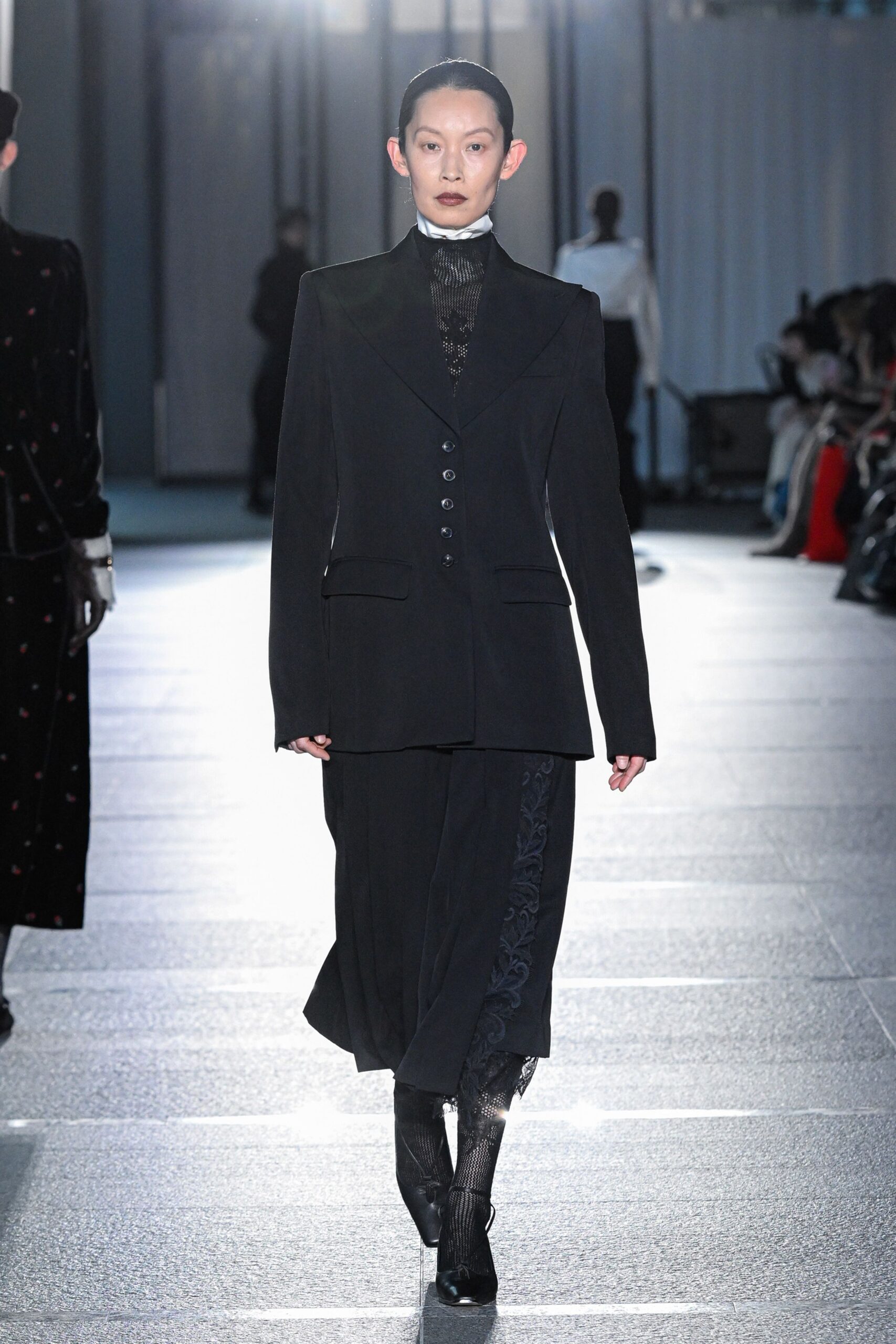 black tailored suit with layered skirt