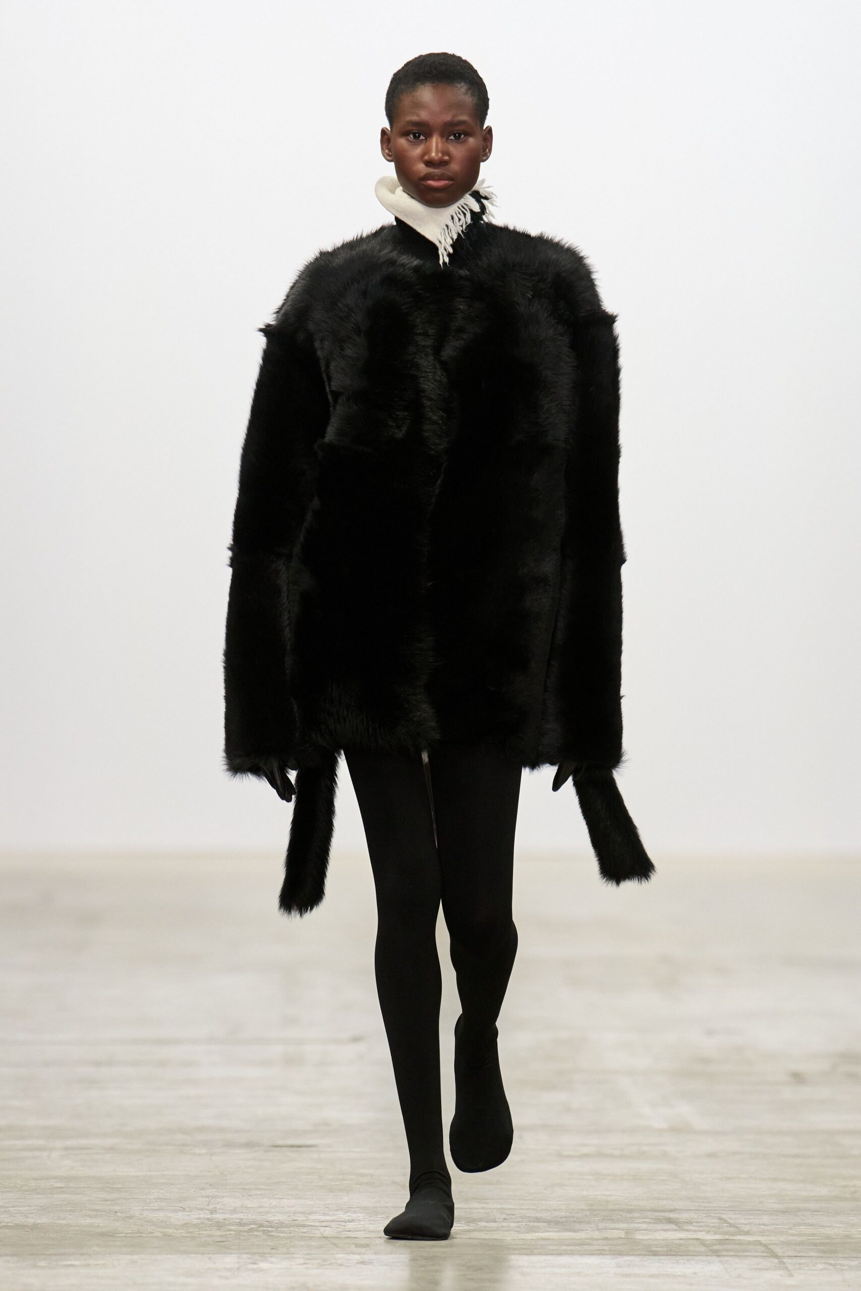 black faux-fur oversized coat