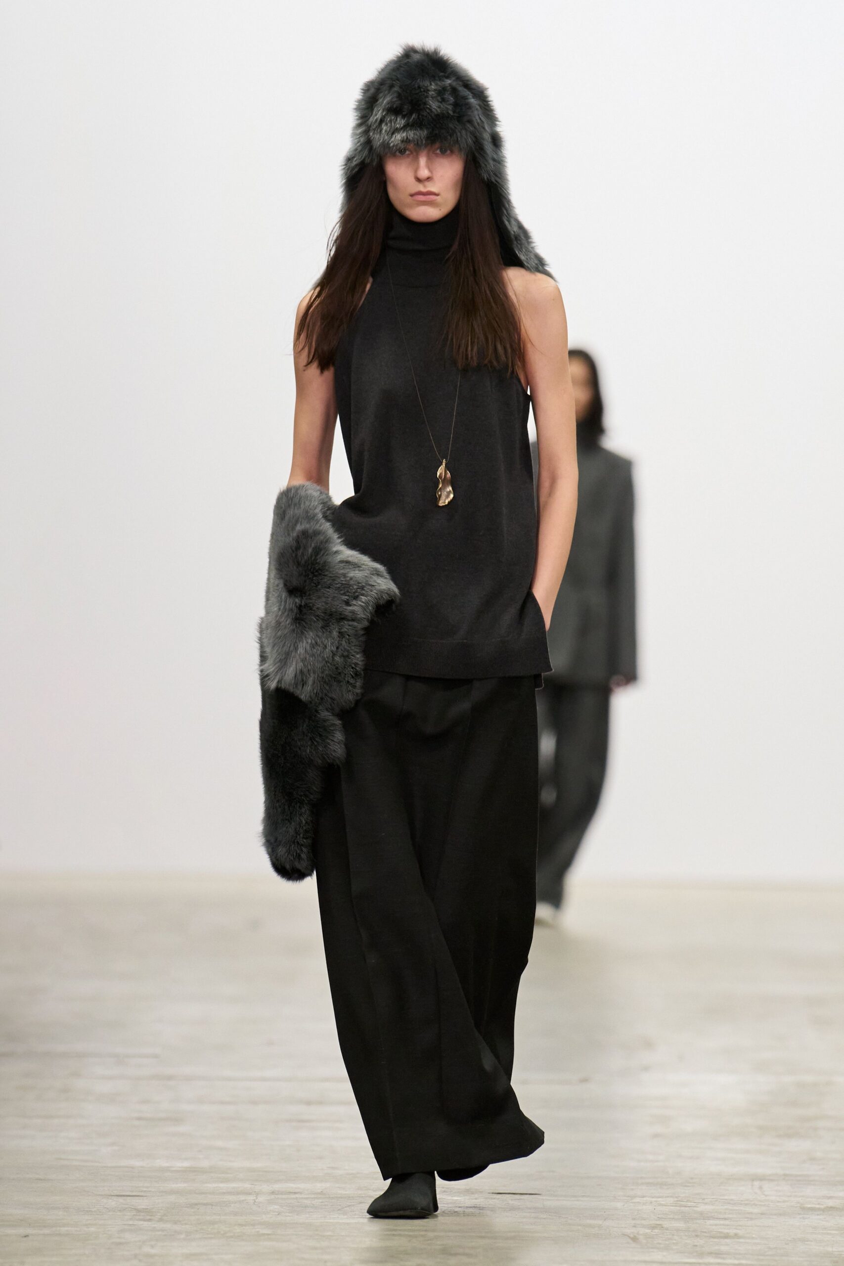 black wool sleeveless turtleneck relaxed top
