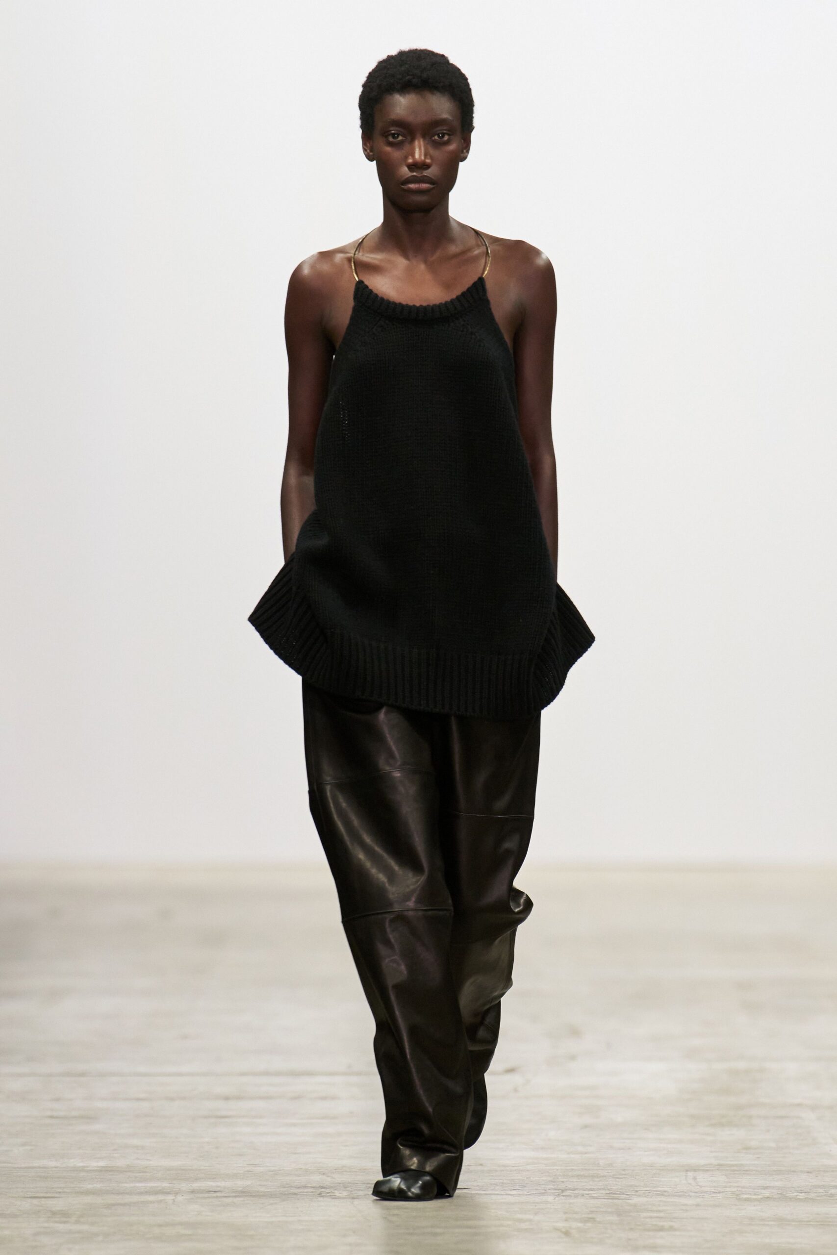 black wool sleeveless relaxed layered top