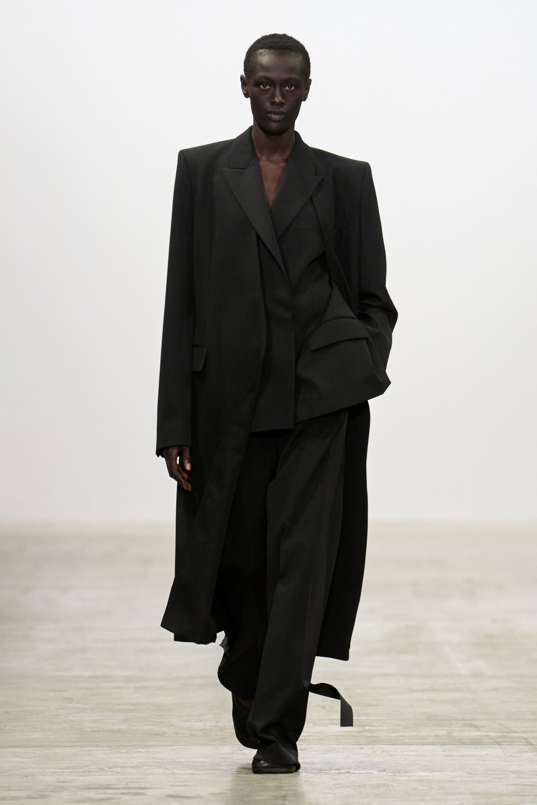 black tailored suit with shoes