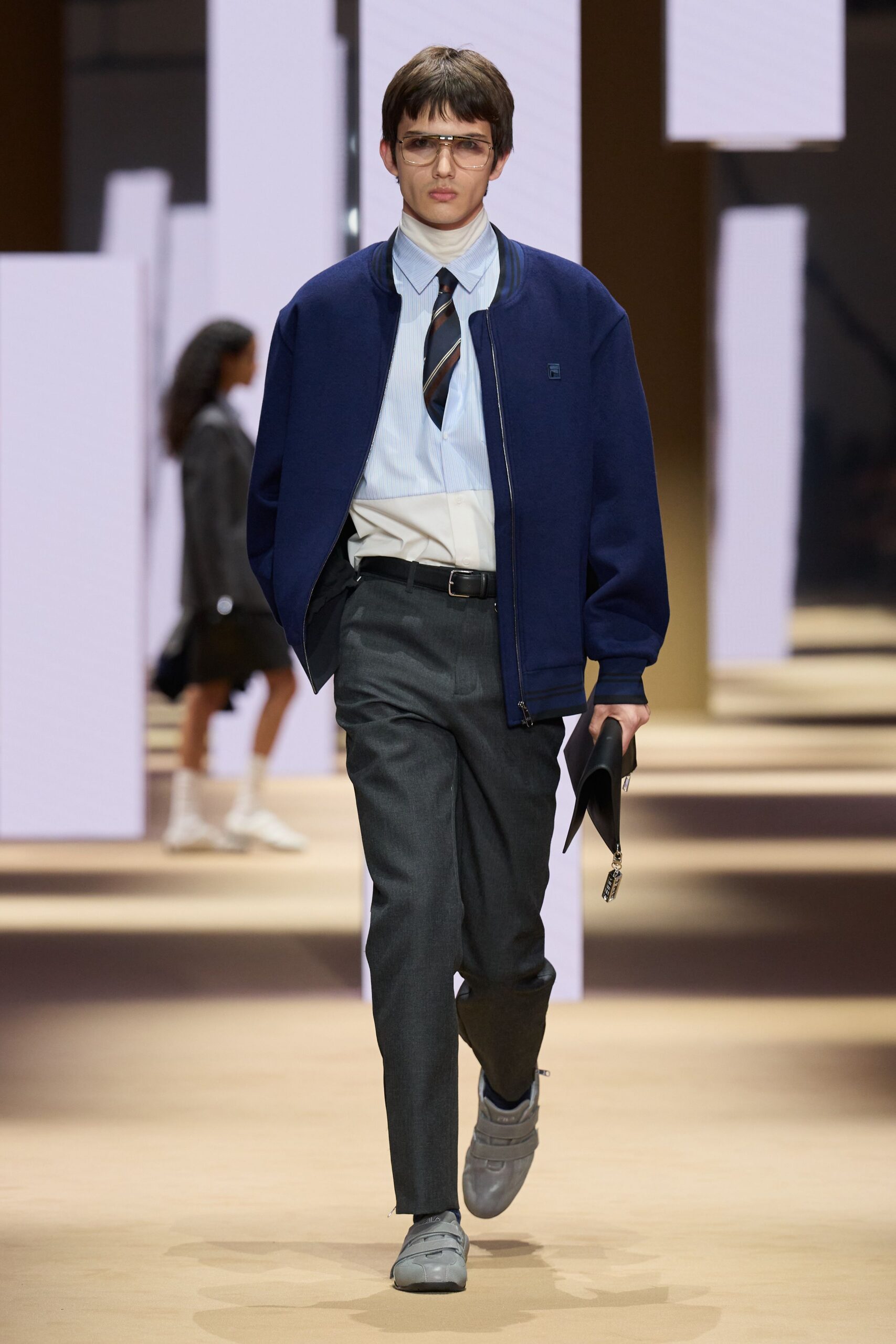 blue jacket white shirt gray pants