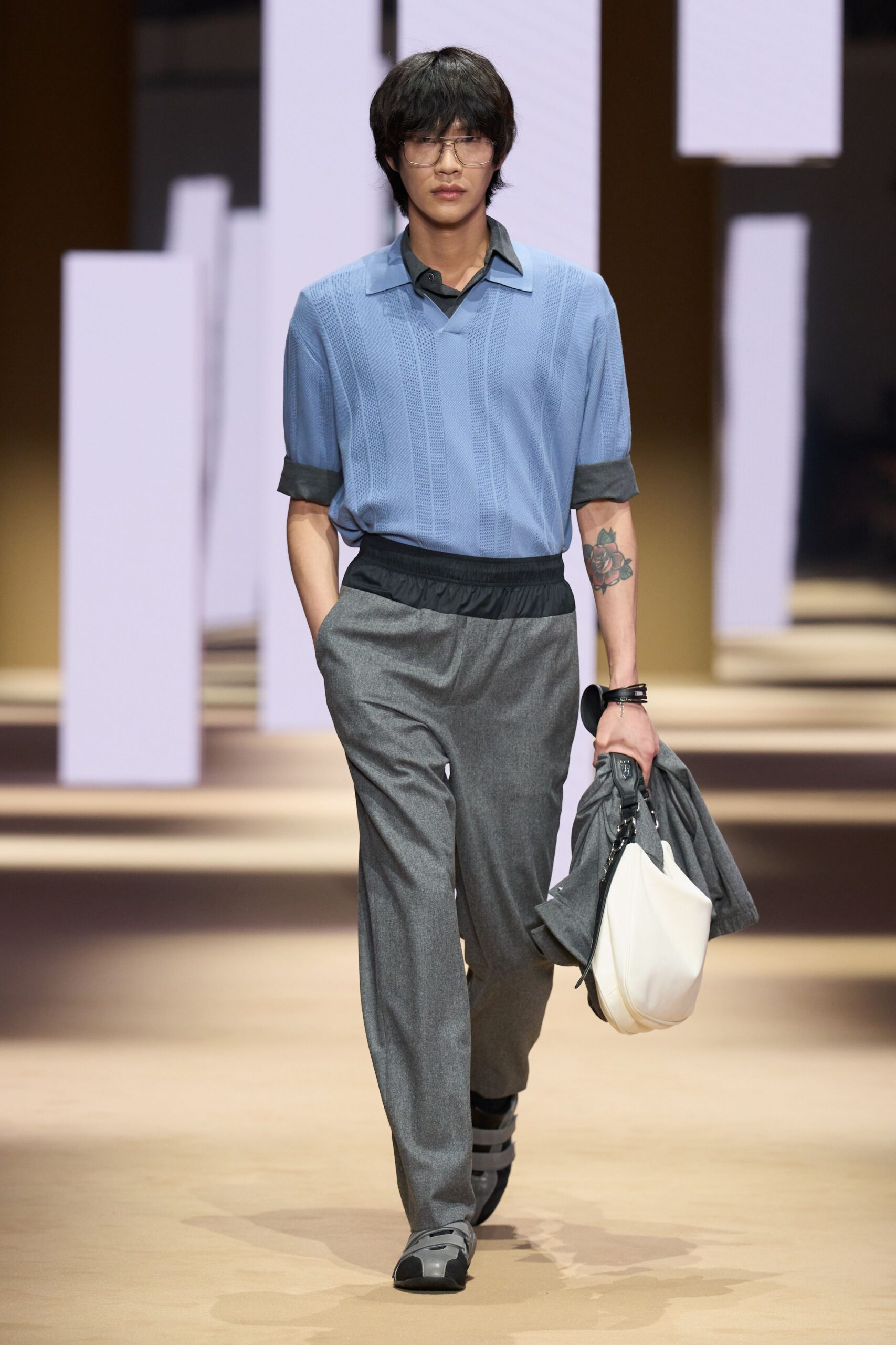 blue relaxed shirt with gray pants