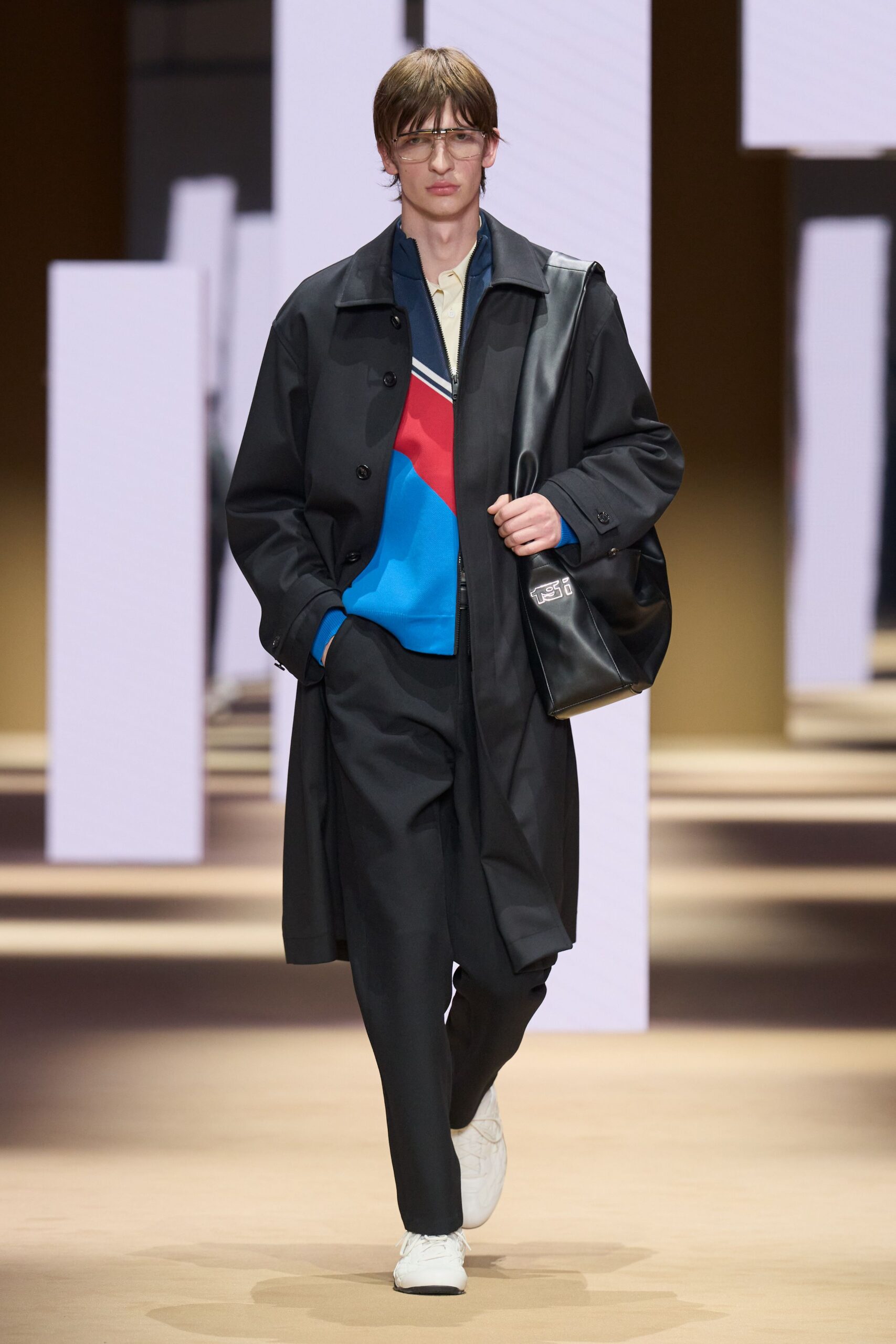 black coat with color-blocked sweater